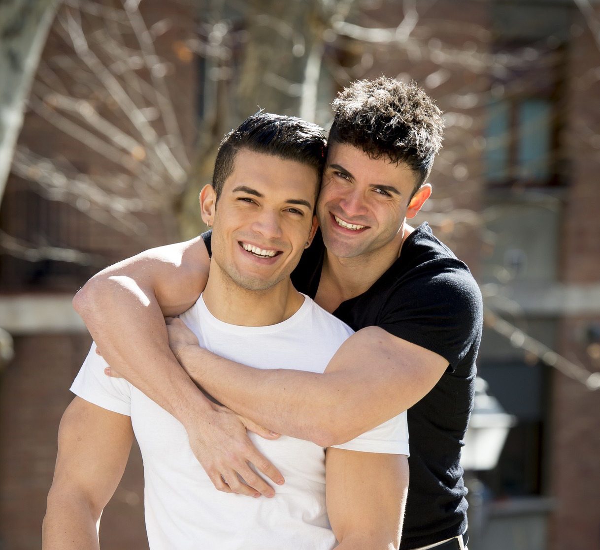 photodune-10417153-young-happy-gay-men-couple-cuddling-on-street-free-homos...