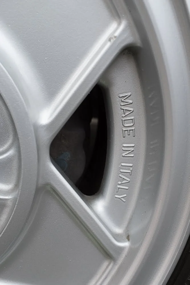 Made in Italy on the wheel rim of an 1970s Alfa Romero.