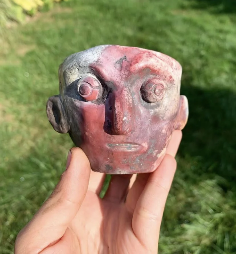 Pitfired Face Cup.jpeg
