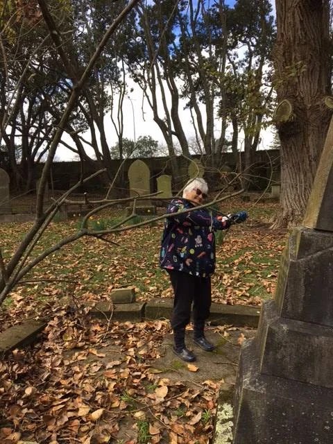 Pruning roses Tricia_Symonds Street Cemetery.jpg