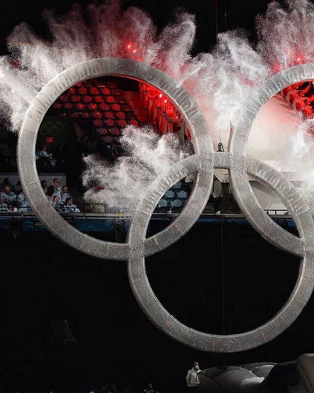 Happy Olympic Day! :: The Olympic Rings are the symbol of the Olympic Games, they represent the five participating continents of the world interlocked and united by Olympism. In this image a local Vancouver snowboarder named Johnny Lyall launched off