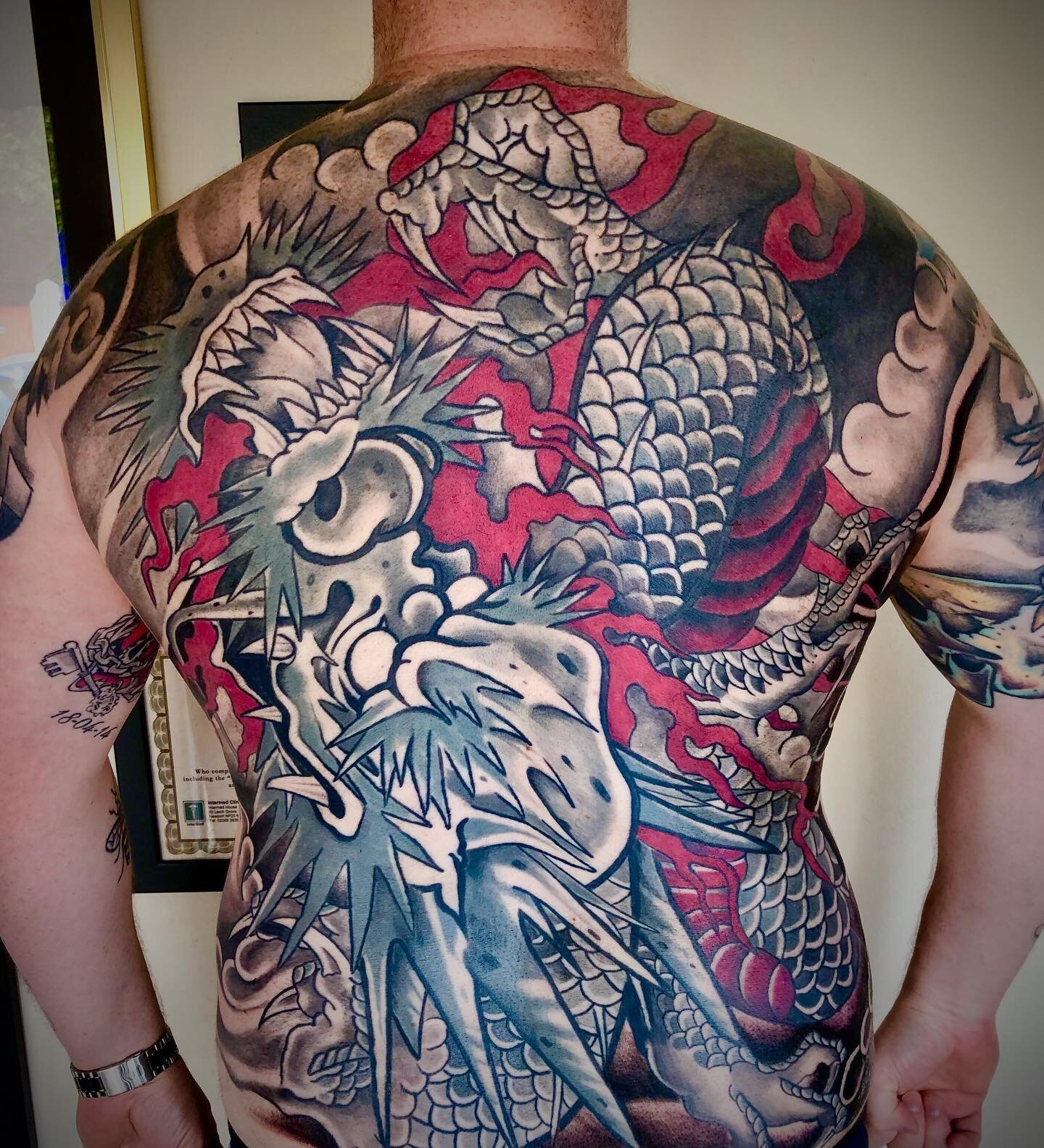 Great first day back at work finishing my friends dragon coverup backpiece. #japanesetattoo #japanesetattoos #dragontattoo #dragon #backpiece #72tattoo #manchester