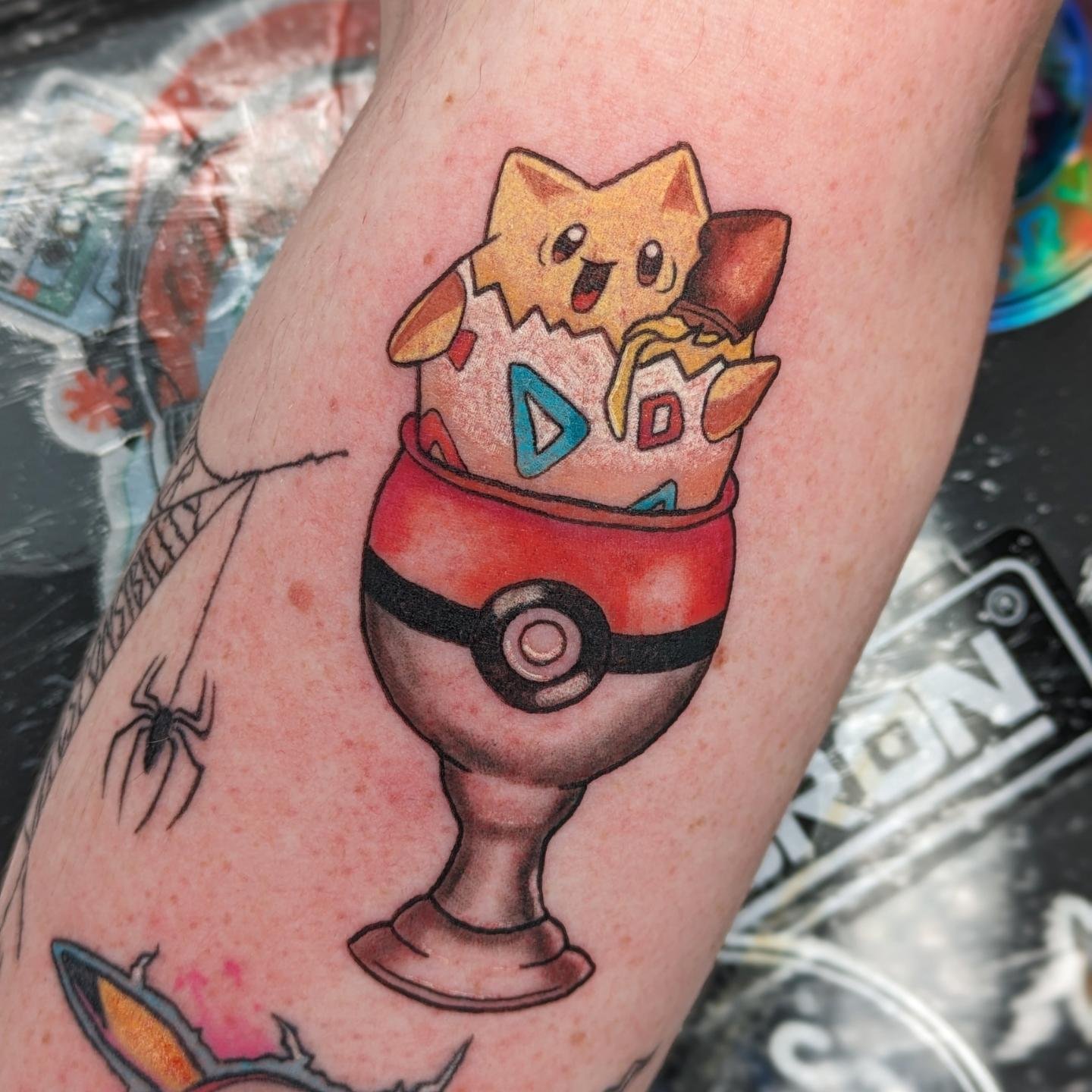 Callum's Pok&eacute;mon collection is growing!
Cracked egg head Togepi sat in his Pokeball eggcup added today by @rachjackson.tattoo 😍😍

Pikachu is almost 1 month healed. Just needed a couple small touch ups in the yellow but settling in lovely!

T