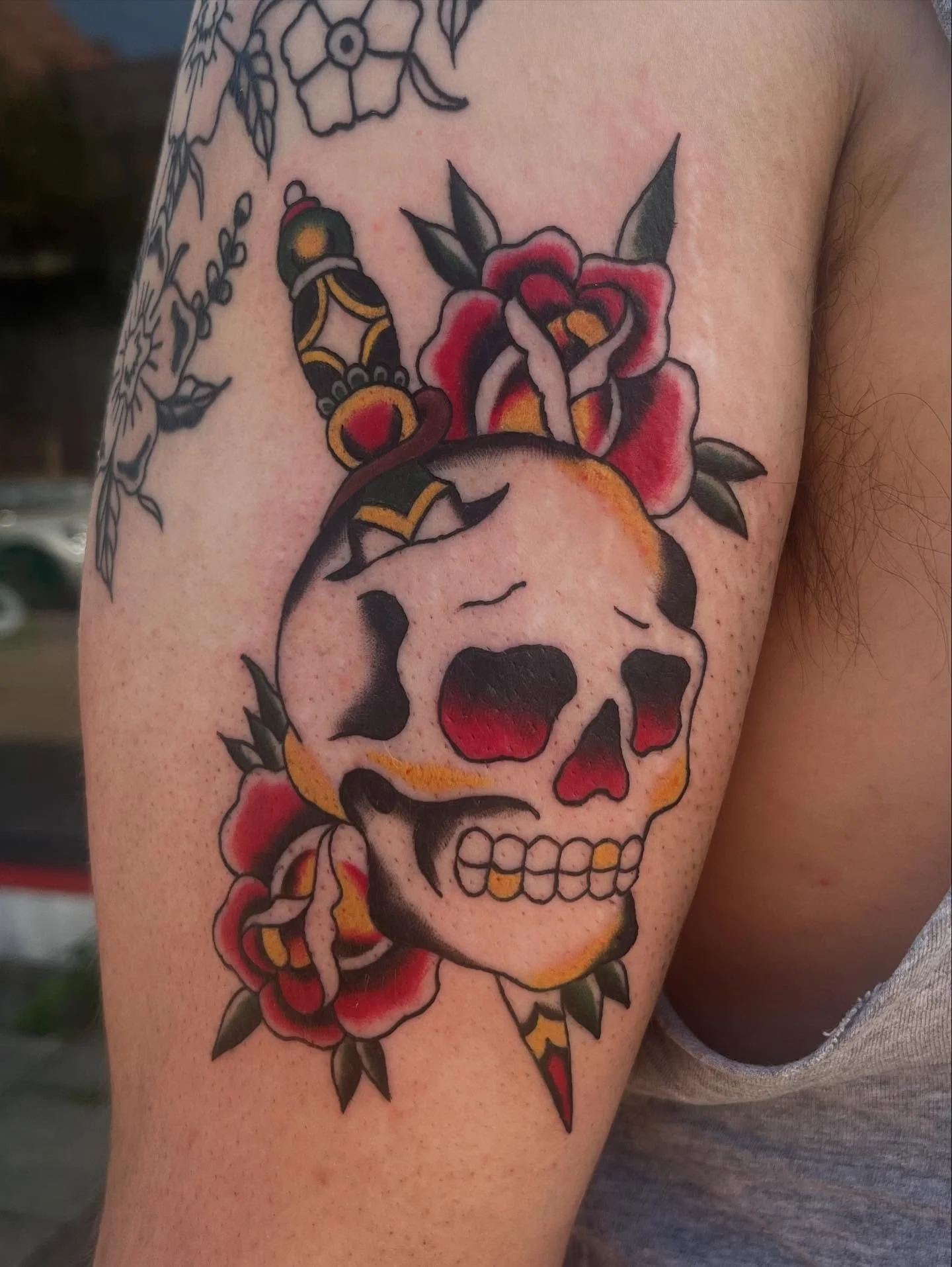 Trad skull and rose made by Izzy @isobelrileytattoo