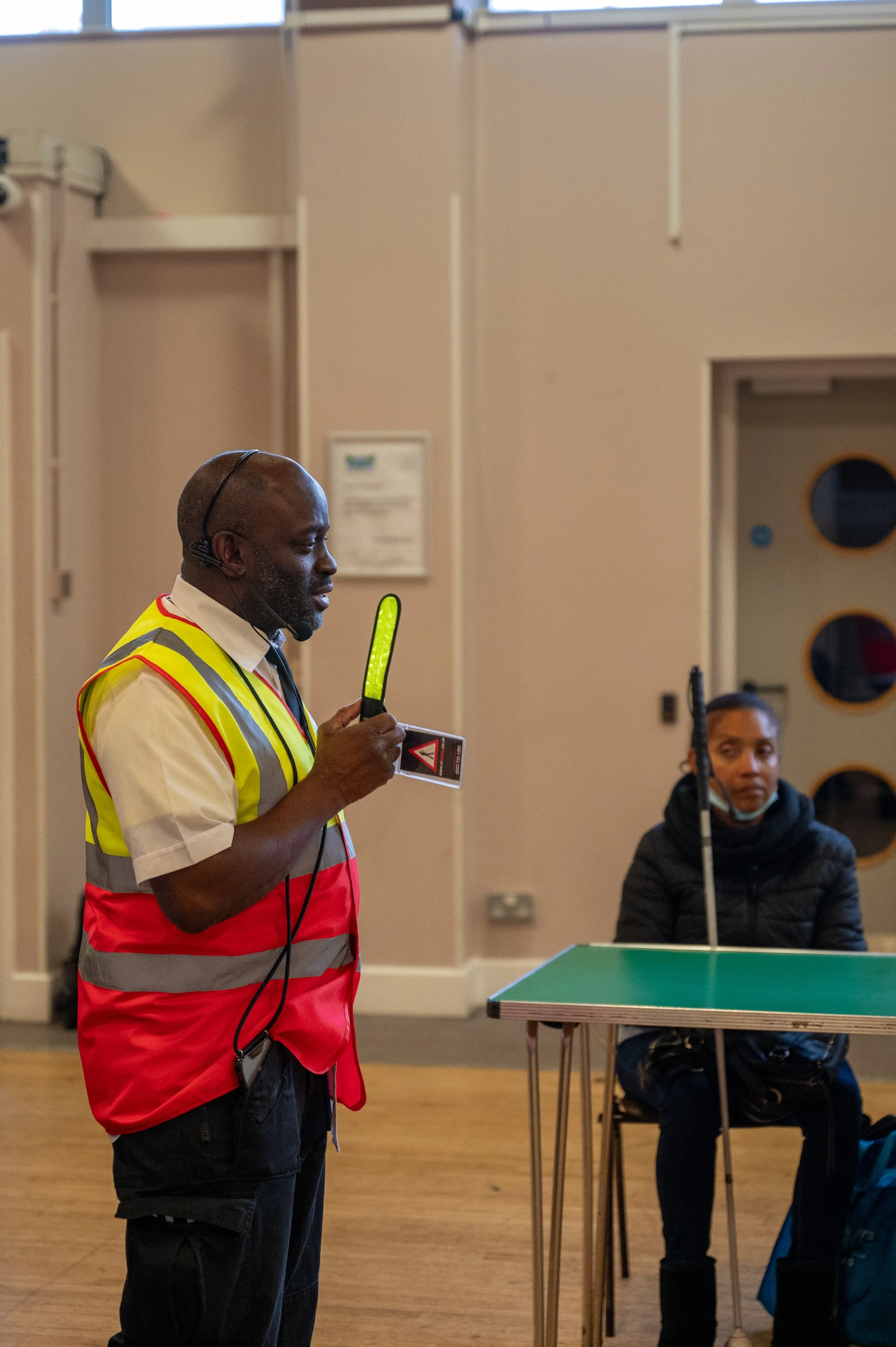  Andrew demonstrates one of the products that he has brought for people to purchase 