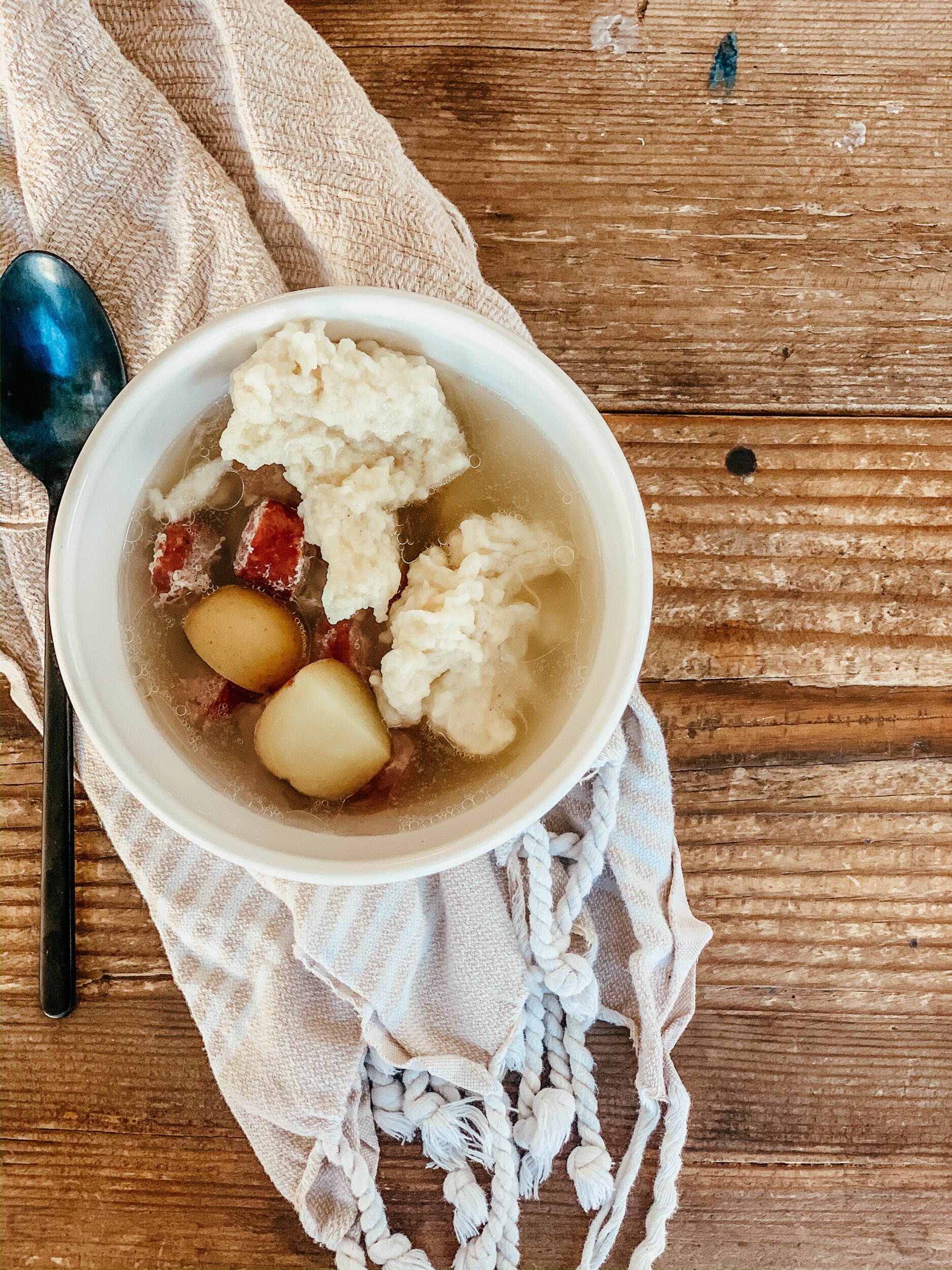 this is a bowl of mennonite farmer sausage soup on a table