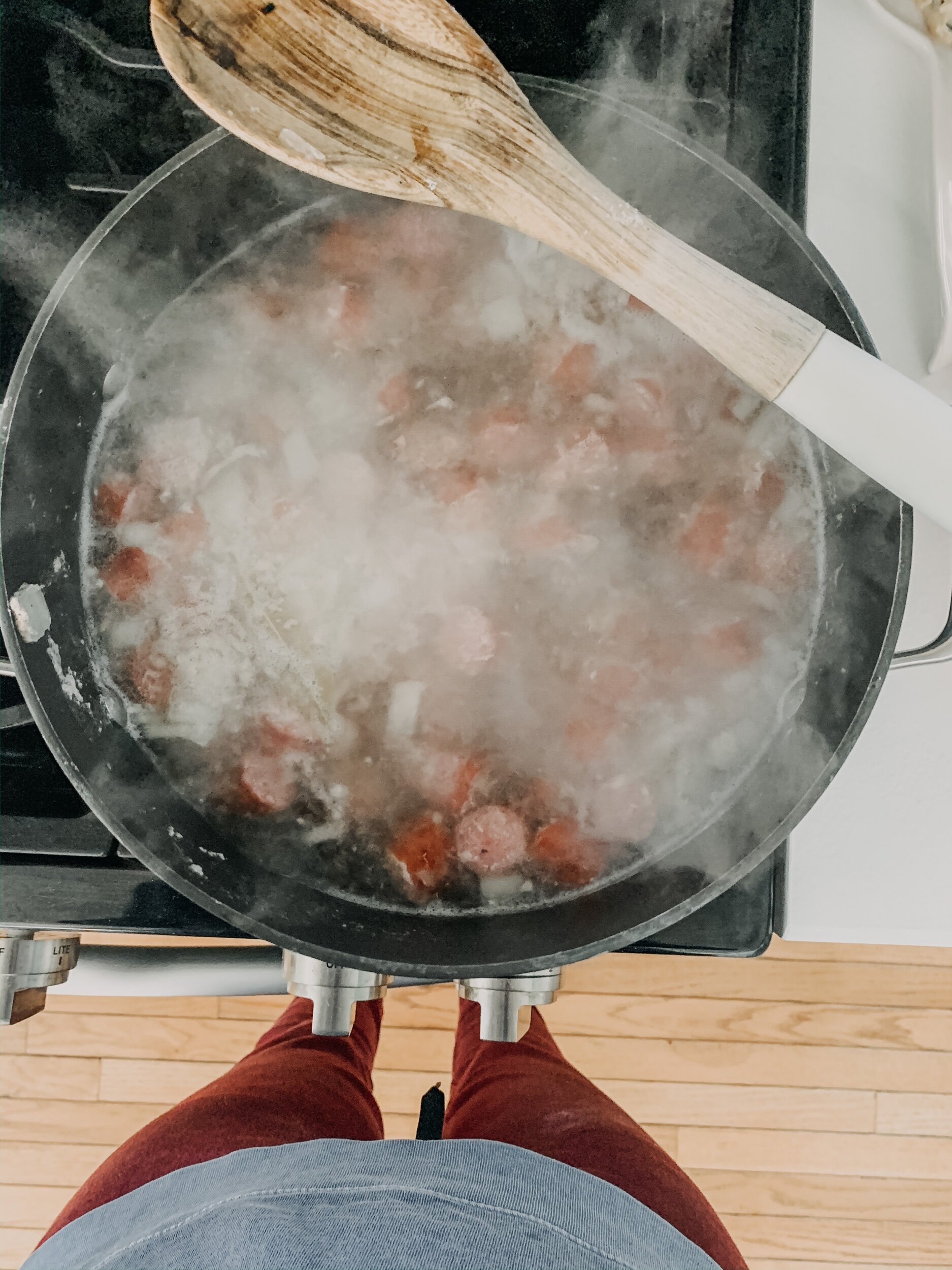 this is a photo of mennonite farmer sausage soup cooking on a stove top