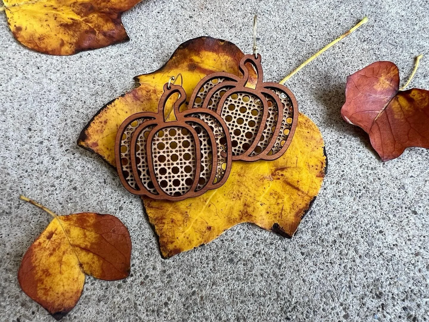 NEW this season, rattan pumpkin dangle earrings!!

Two-layer, solid wood, handmade, 18k gold plated stainless steel earring wires and did I mention RATTAN?!