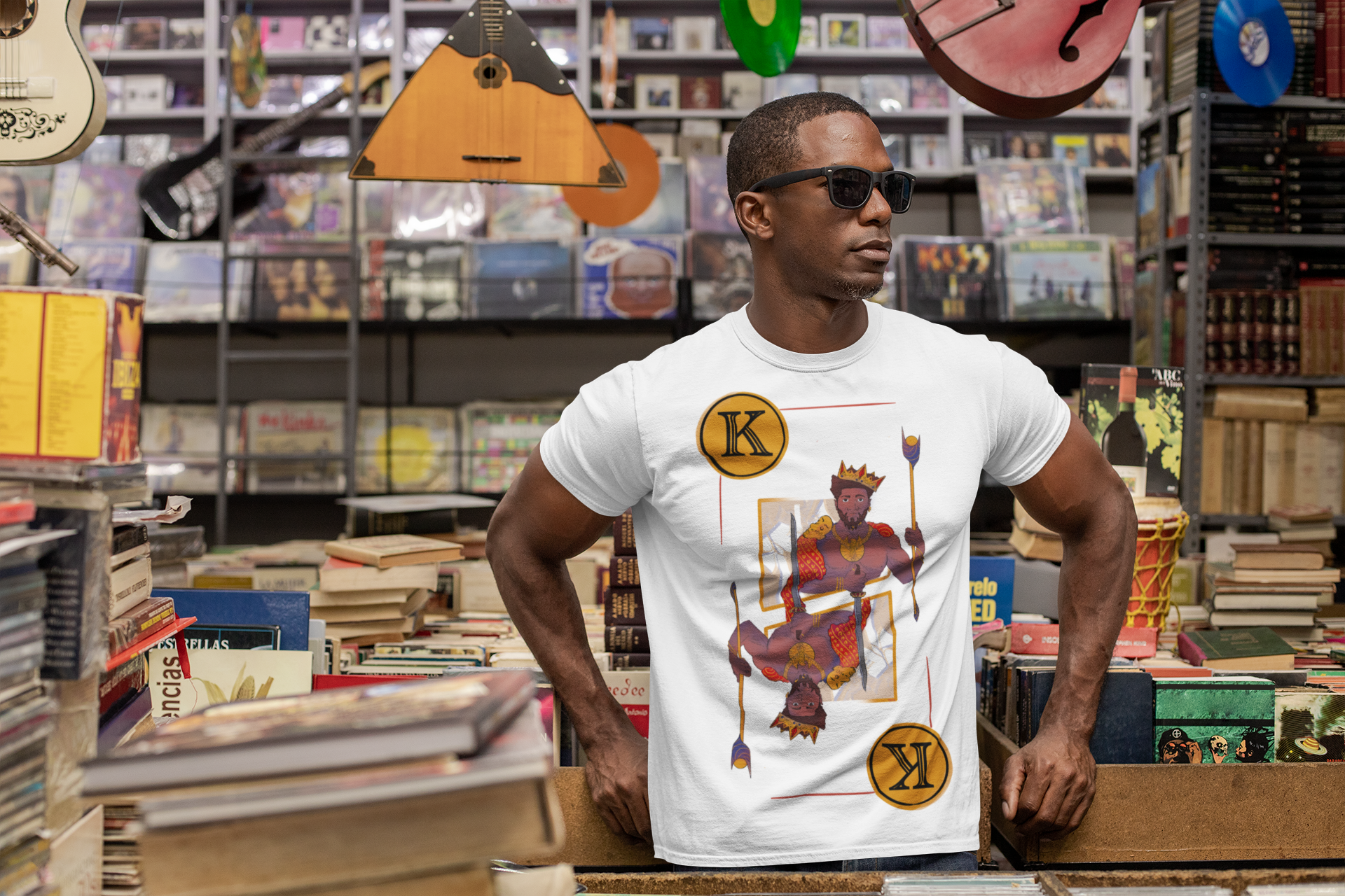 t-shirt-mockup-featuring-a-man-with-sunglasses-at-a-vintage-records-store-30452 (2).png