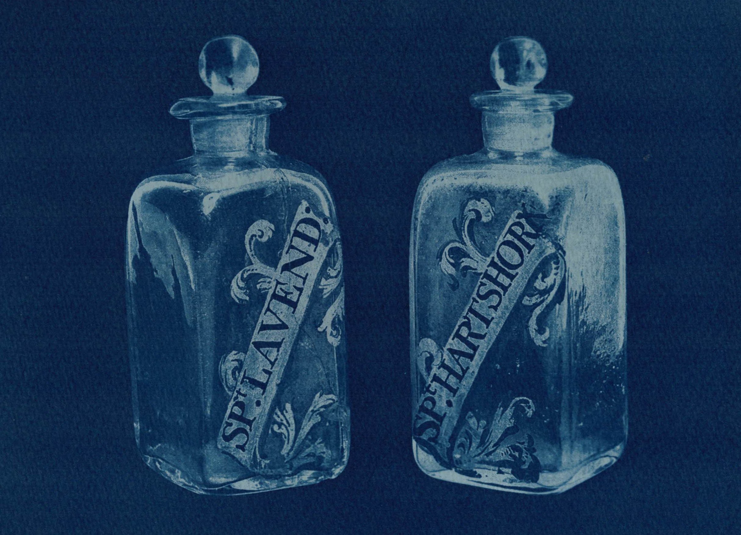 Marge_Bradshaw_Photography_Cyanotype using Wellcome Collection wo Glass Bottles, marked SPt. LAVEND and SPt HARTSHORX.jpg