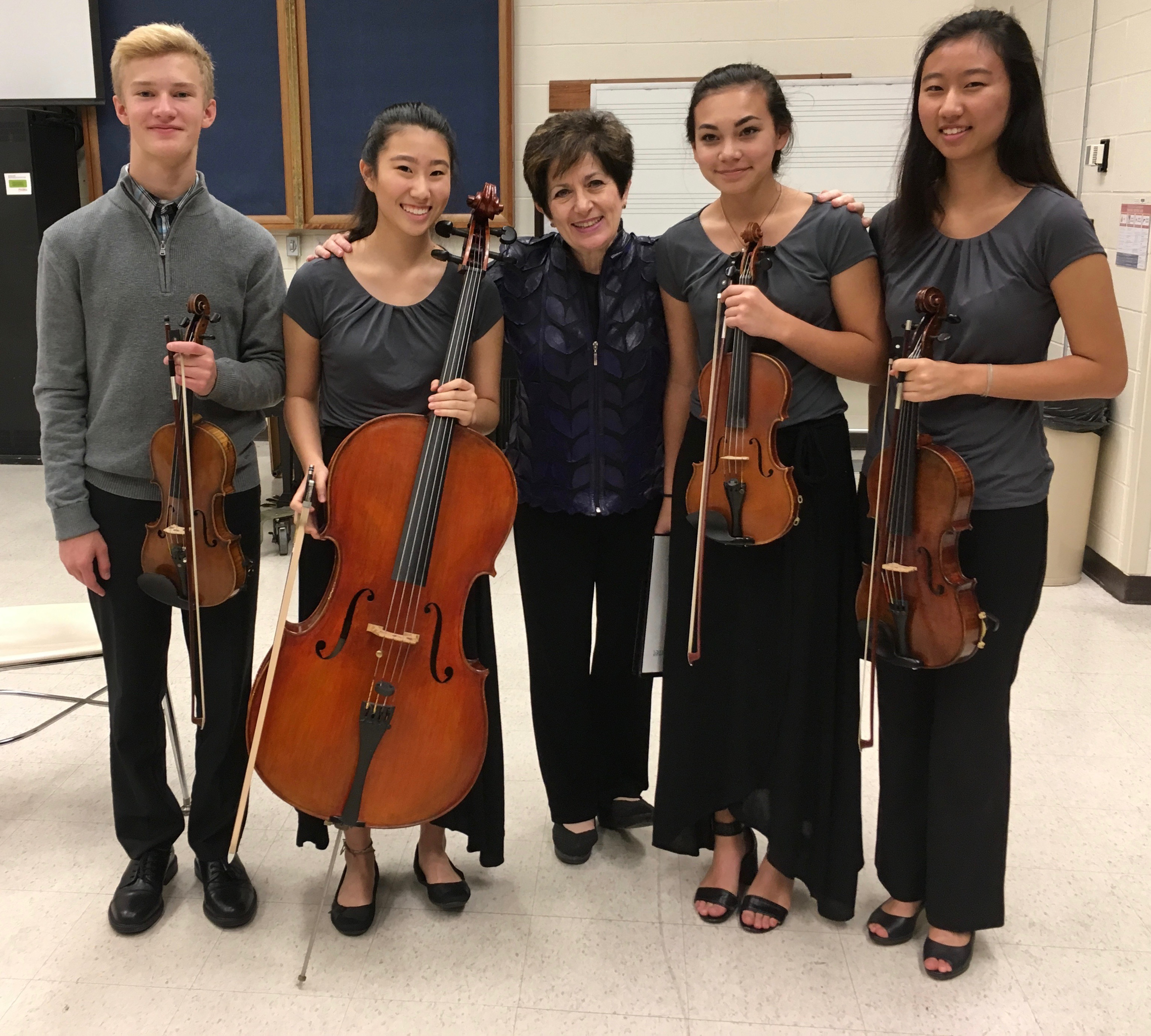 Ida Kavafian, world-renowned violinist and professor at the Juilliard School and the Curtis Institute, with the Klier String Quartet made up of student from Ames and Gilbert High School.