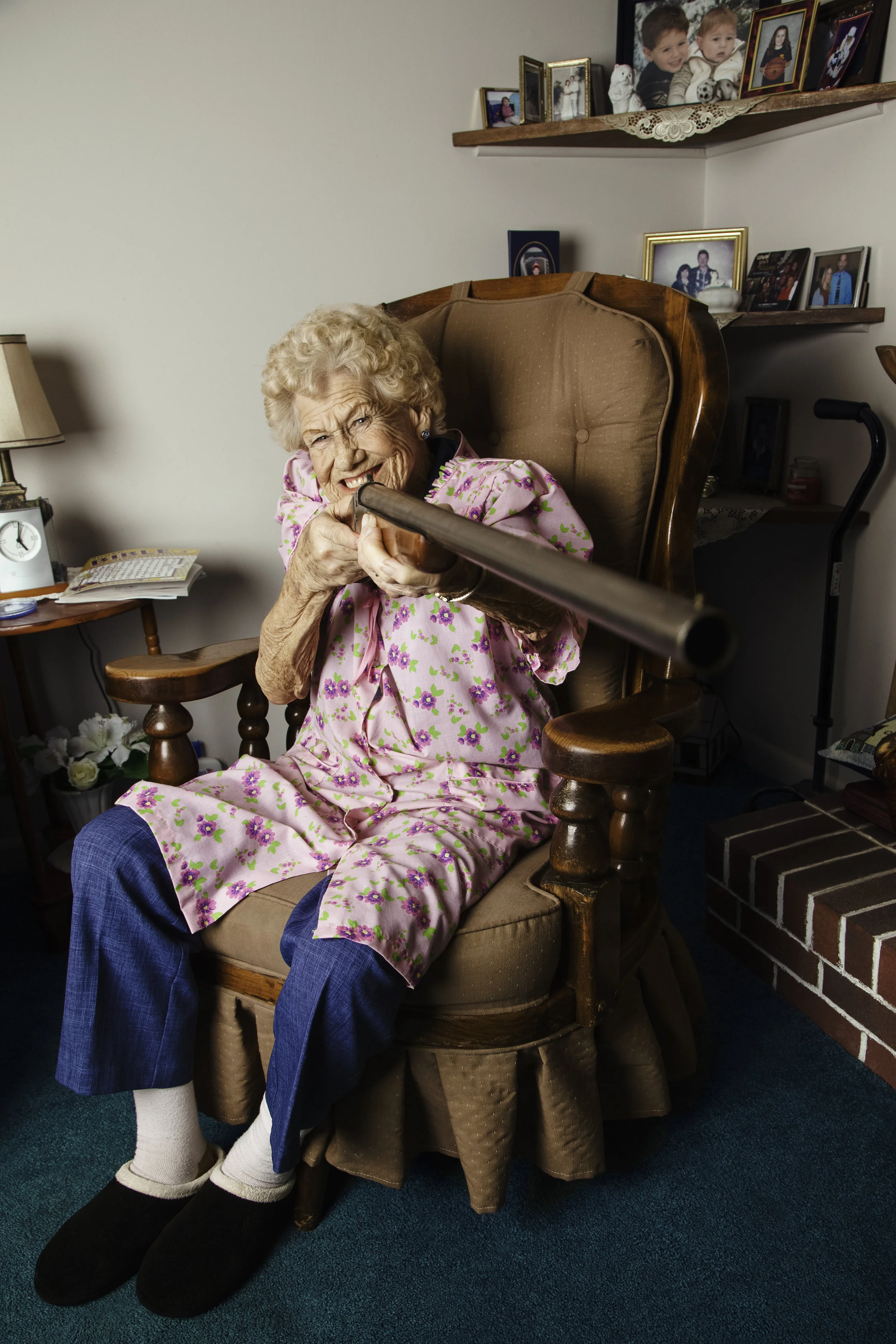 Love my Great Grandma Rhea McPeak! -- (also: we are all about gun safety, the gun was checked twice for bullets before we gave it to her and she just did whatever she wanted too! There are guns all over her house and we had such a fun time taking these pictures! She can't hear a lick so even if it was to tell her not to point it at me she couldn't hear me.. ahhaha) - © Candice Corbin Photography - candicecorbin.com.