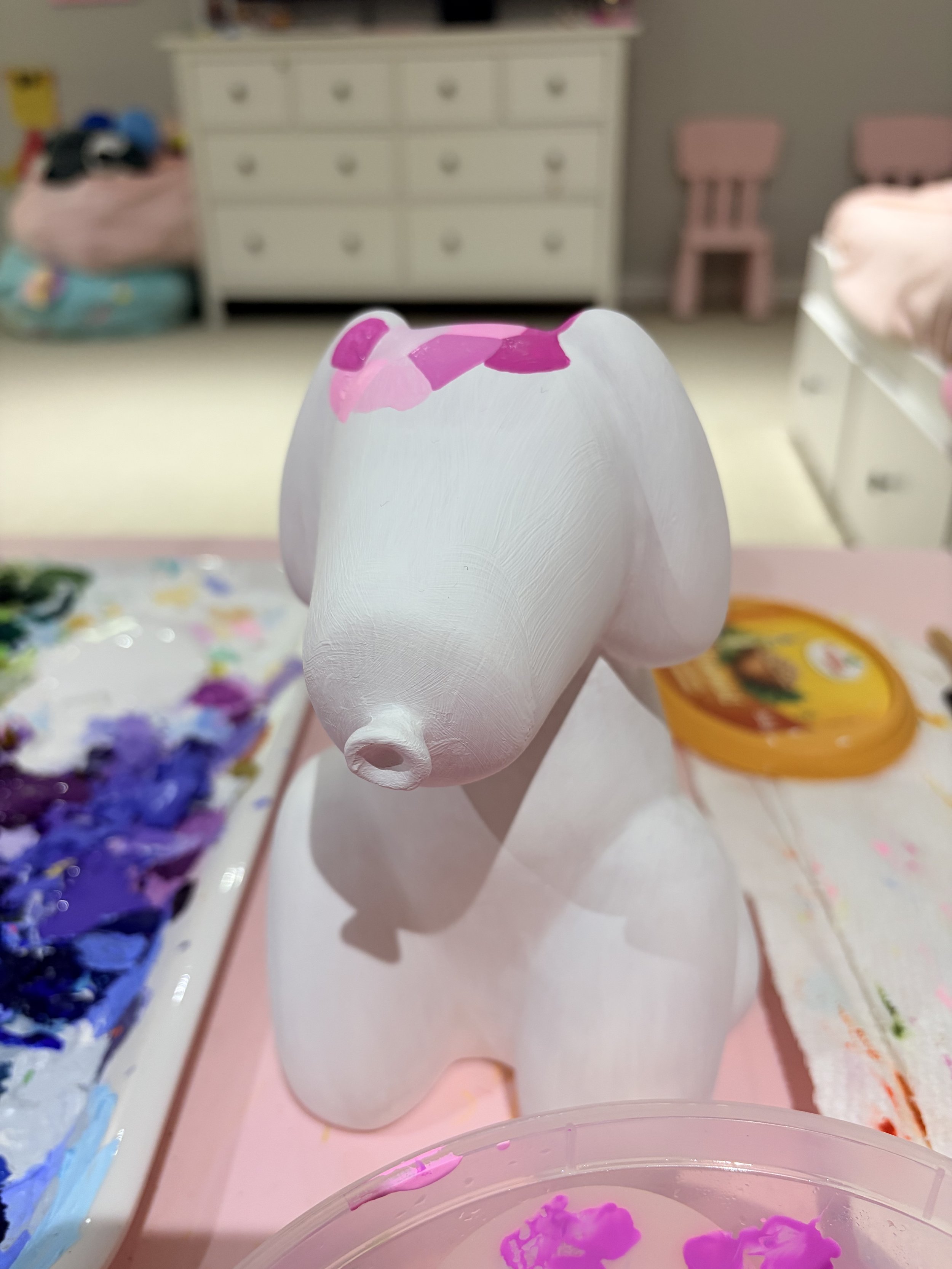Balloon dog starting to paint pink