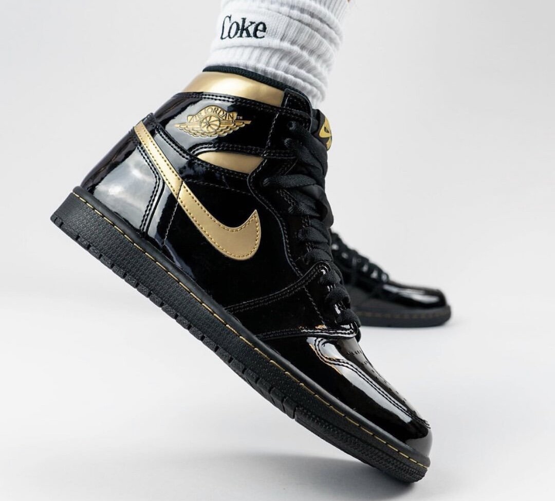 Air-Jordan-1-Black-Gold-555088-032-Release-Date-On-Feet-8.jpg