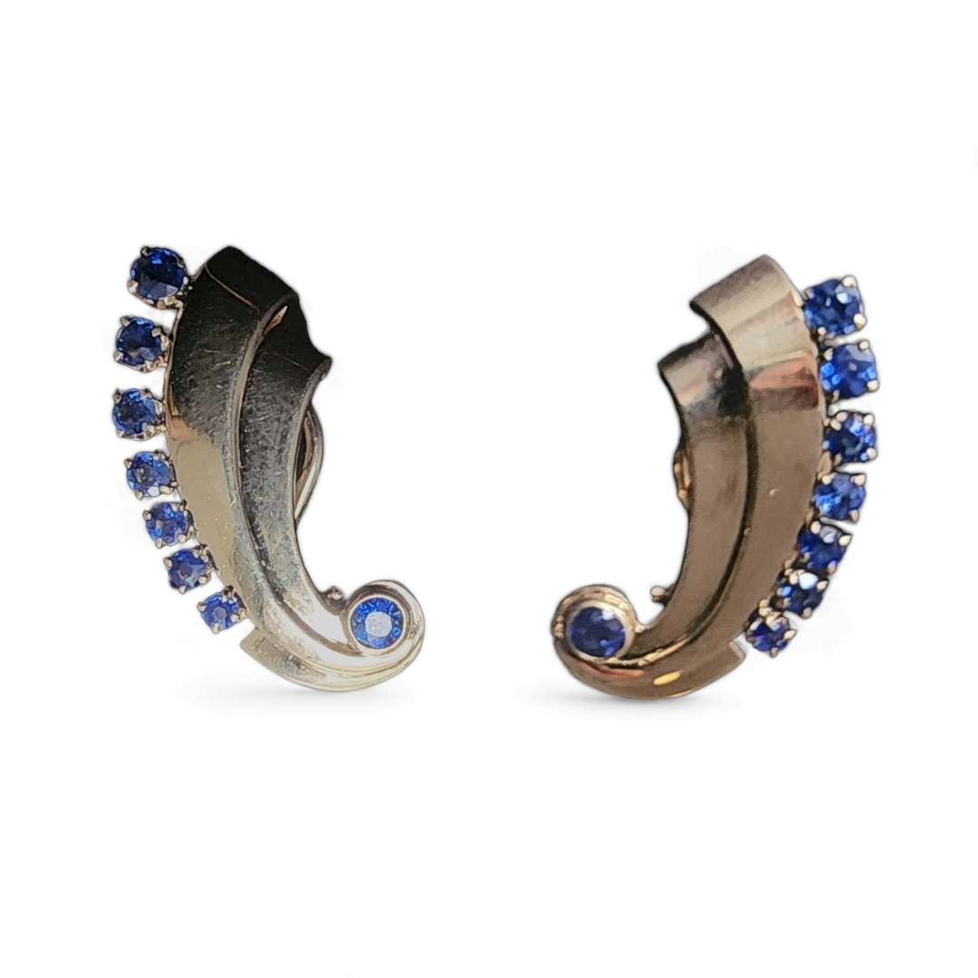 MID CENTURY GOLD AND SAPPHIRE EARRINGS, 14kt rose gold swirls set with Montana Sapphires 