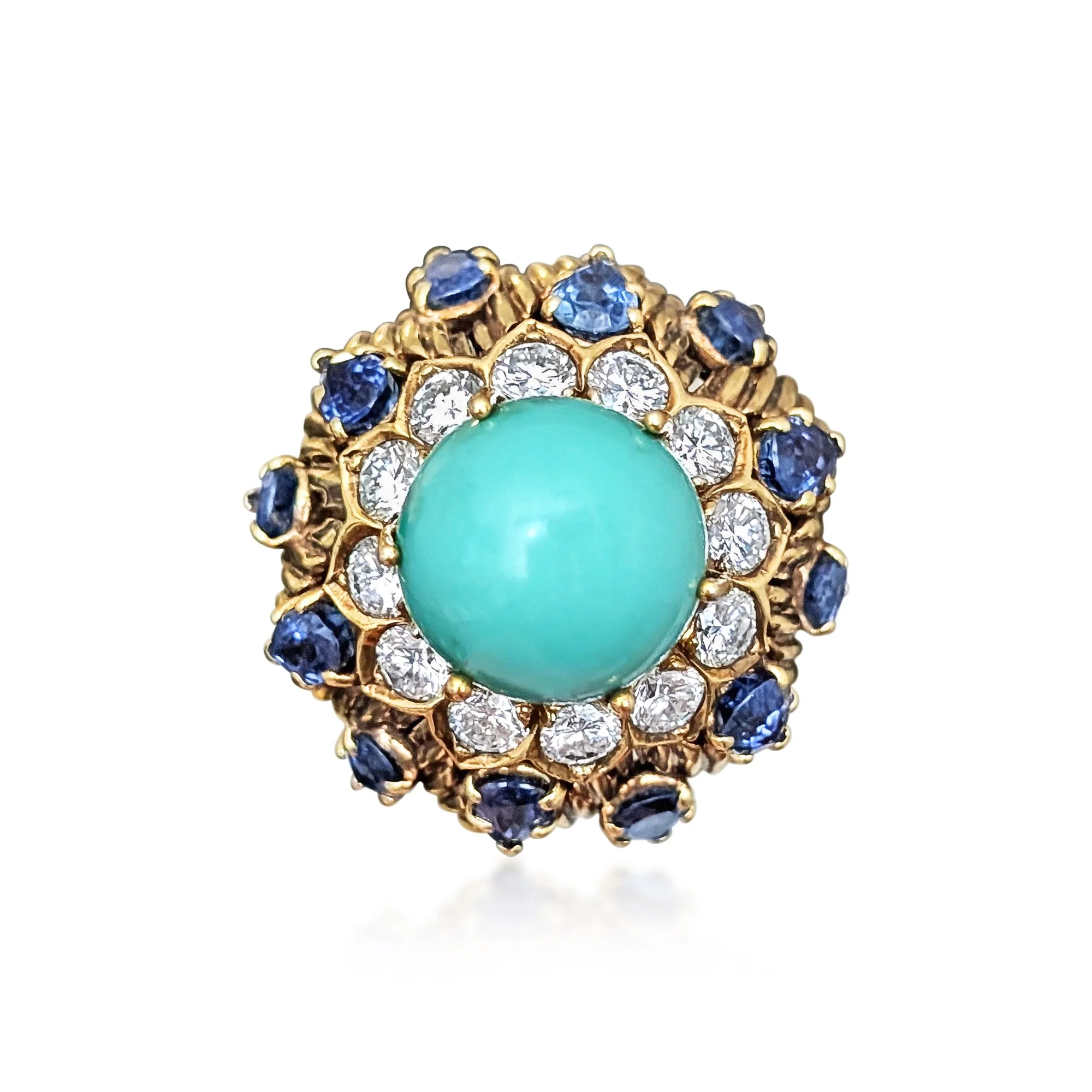 1960's TURQUOISE MULTI GEM DRESS RING 
centering upon a round cabochon turquoise, in a surround of round
brilliant-cut diamonds, accented by pear shape sapphires