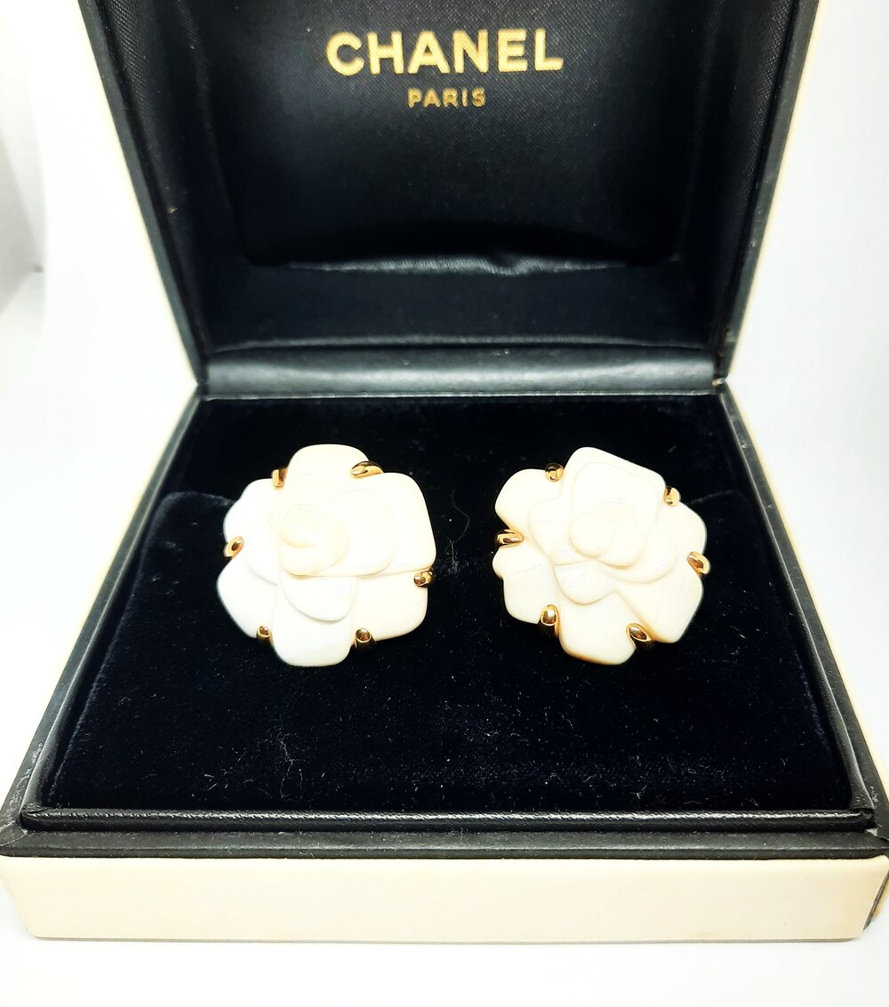 1980's Chanel Camelia gold and white ceramic earclips — arts