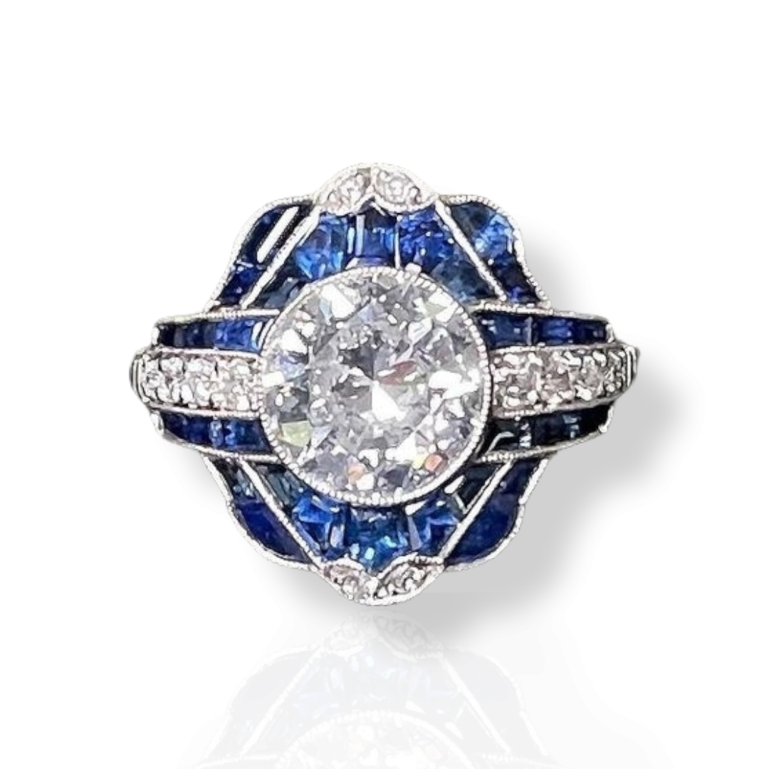 Old European cut diamond and sapphire ring in platinum