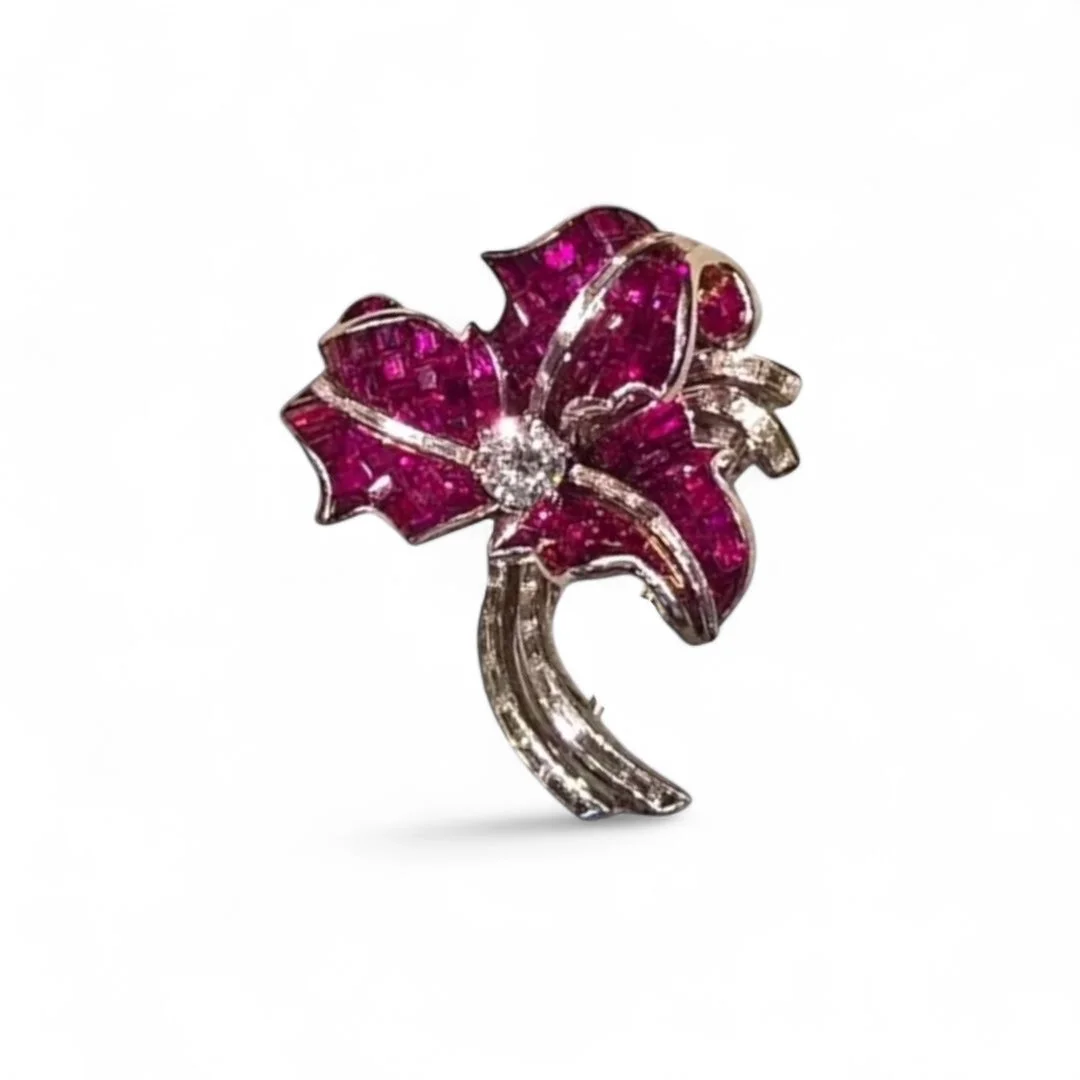 Art Deco invisibly set ruby and diamond clip brooch