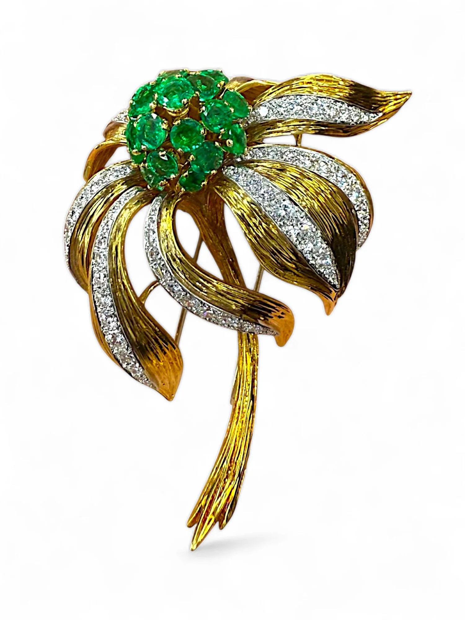 OSCAR HEYMAN BROS 1950'S PLATINUM, GOLD, EMERALD AND DIAMOND FLORAL BROOCH