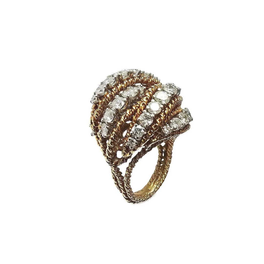 Vintage 1960's Gold & Diamond Domed Cocktail Ring

A 1960’s  domed ring in heavily textured, two-tone 18kt gold set with round brilliant cut diamonds circa 5.5 cts total weight 16.05 gr. Size USA 5, resizable. 
