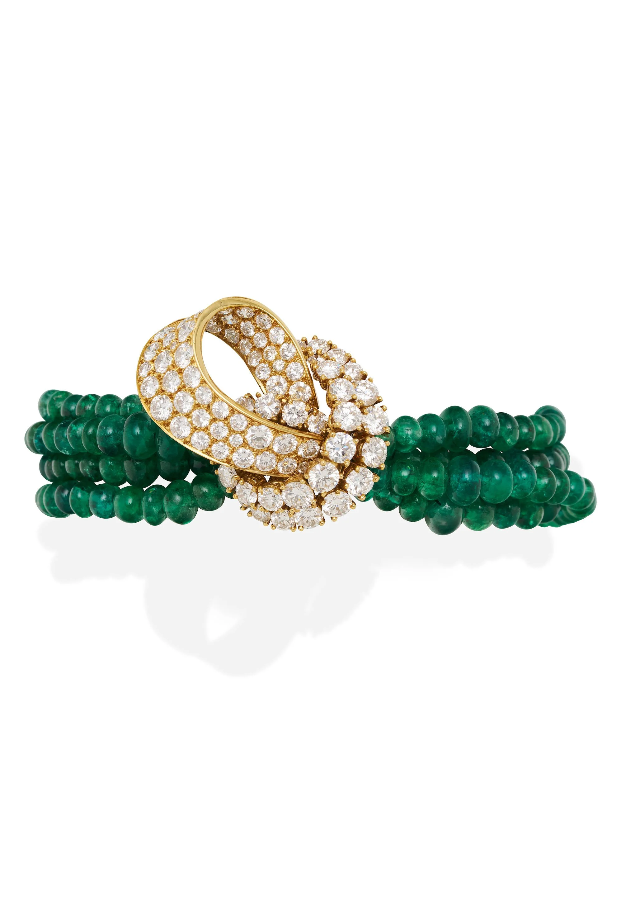 EMERALD DIAMOND AND 18K GOLD BRACELET by GERARD
designed as four strands of emerald beads, with a pave-set round brilliant-cut diamond clasp weighing approximately 7.6 carats total, mounted in 18 karat yellow gold, signed M. Gerard with maker's mark 