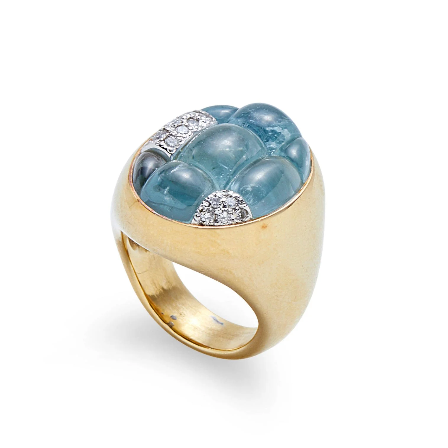 POMELLATO: AN 18K GOLD, AQUAMARINE, AND DIAMOND "MOSAIQUE" RING
Set with seven calibré-cut aquamarine cabochons, with full-cut diamond accents,