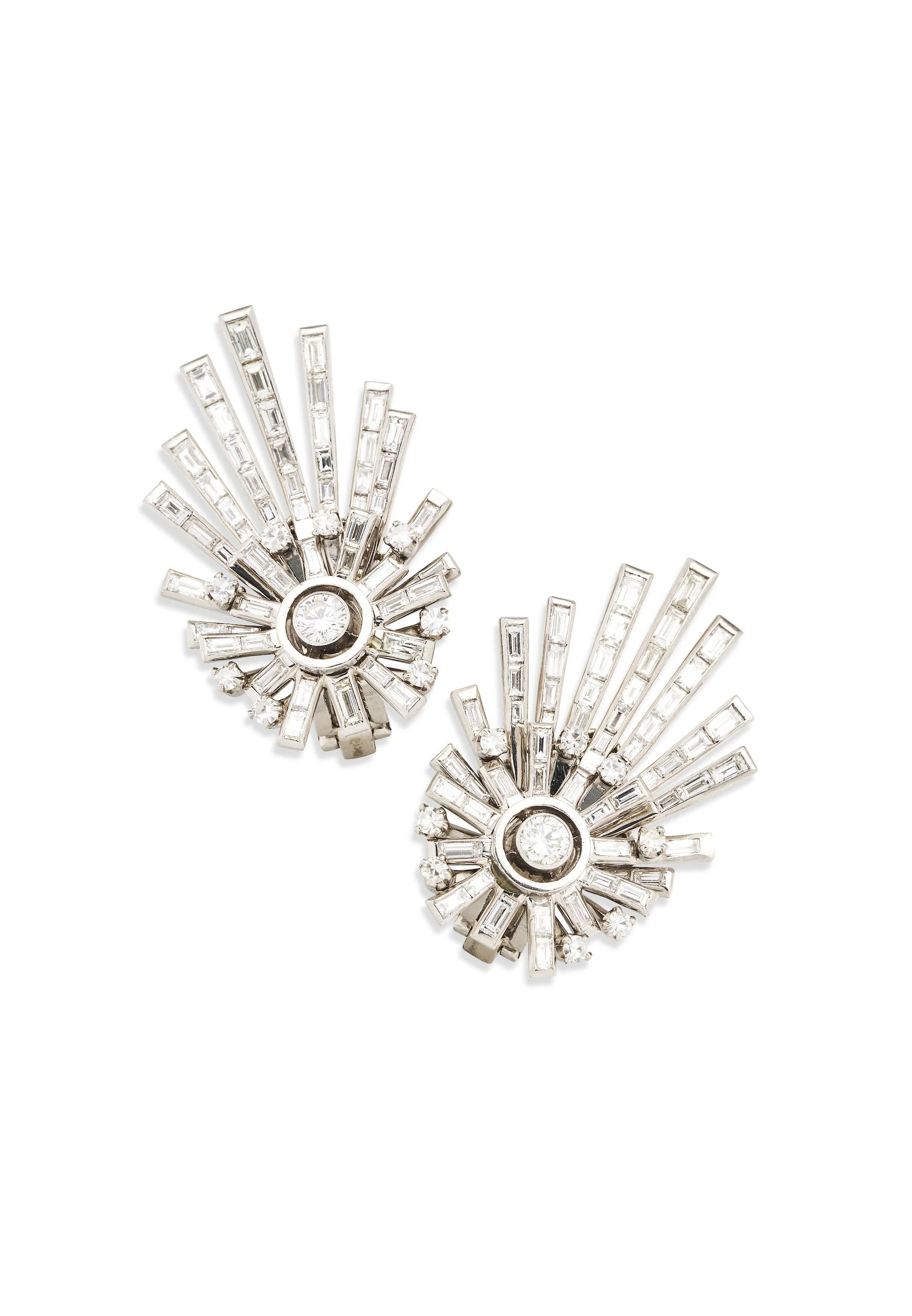 MID CENTURY 1950's PLATINUM AND DIAMOND SPRAY EARRINGS Each earlclip designed as a starburst motif set with 9 brilliant cut diamonds and 18 baguette cut diamonds surmounted by ascending rays set with an additional 36 baguette cut diamonds . Total dia