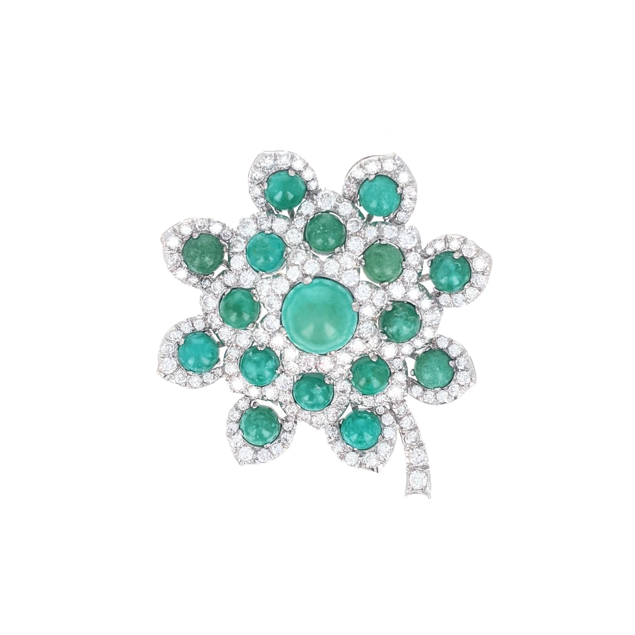 PERSIAN TURQUOISE DIAMOND AND 18K GOLD BROOCH
of flower design, with round-shaped cabochon turquoise encircled by round brilliant-cut diamonds weighing approximately 7.5 carats, mounted in 18 karat white gold, measuring approximately 5 x 5.5cm