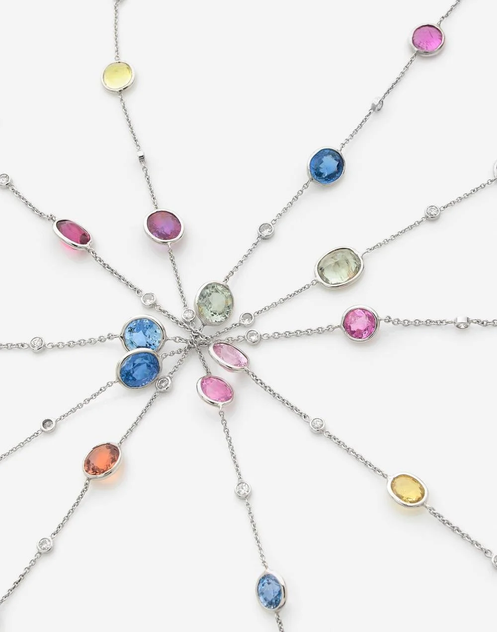 contemporary SAPPHIRE, DIAMOND & GOLD LONG NECKLACE OR 5 BRACELETS. A fancy sapphire and gold necklace composed by 5 bracelets. The sapphires and diamonds set in eye glass wire to the 18k white gold cable link chain.Length: approx. 21cm each, Total g
