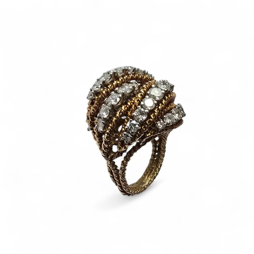 Vintage 1960's Gold & Diamond Domed Cocktail Ring
A 1960’s  domed ring in heavily textured, two-tone 18kt gold set with round brilliant cut diamonds circa 5.5 cts total weight 16.05 gr. Size USA 5, resizable.