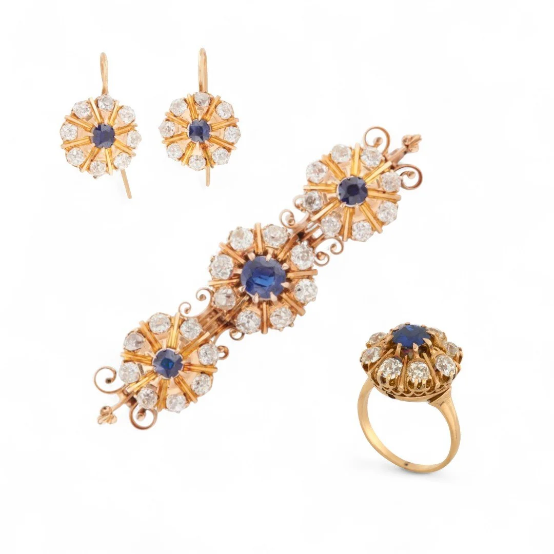 ANTIQUE 19th CENTURY SAPPHIRE AND DIAMOND GOLD BROOCH, RING AND EARRINGS An 18k gold bar brooch set with three clusters of sapphire and diamond elements that can be removed from the brooch to be worn as earrings and ring. Circa 1880's. 