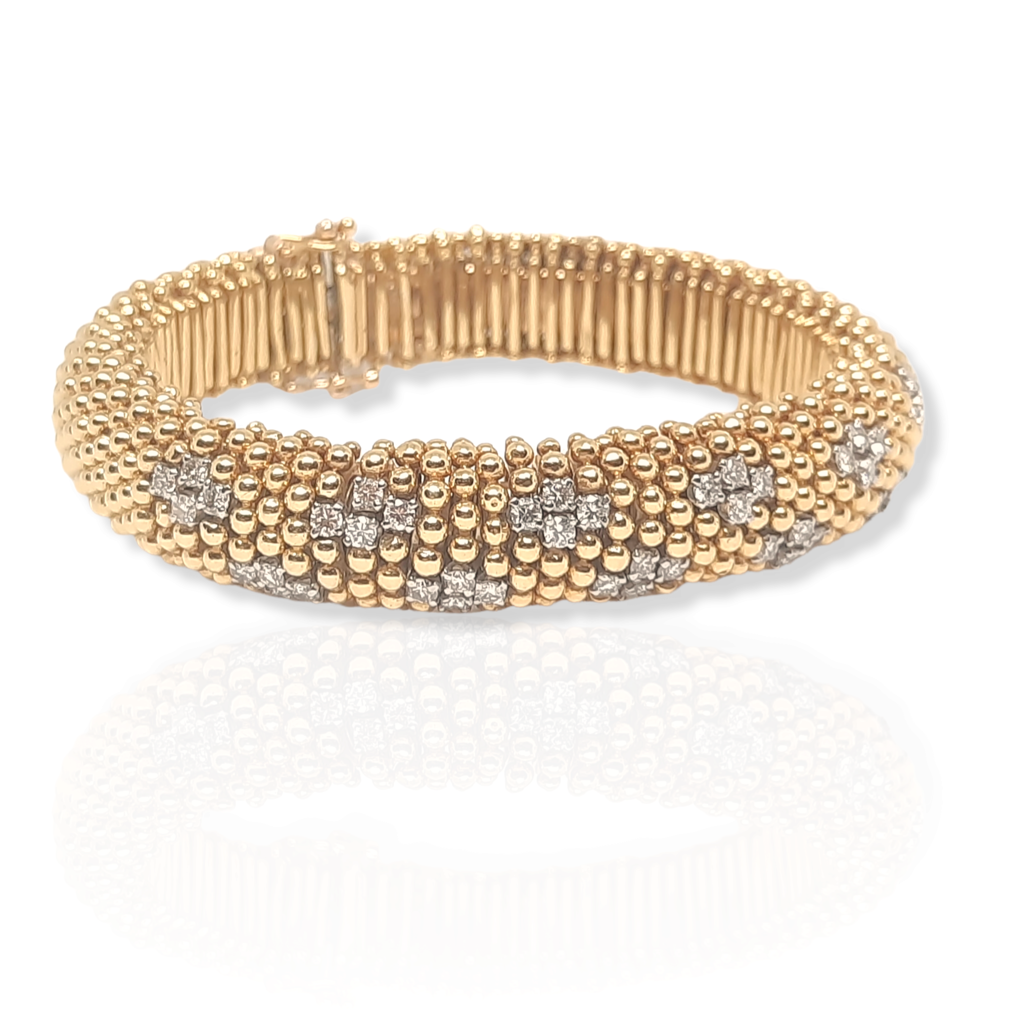 MID CENTURY 1960'S GOLD & DIAMOND "COUS-COUS" BRACELET The highly articulated and textured 18k gold bracelet set with diamond accents, 18cms, 89 grams