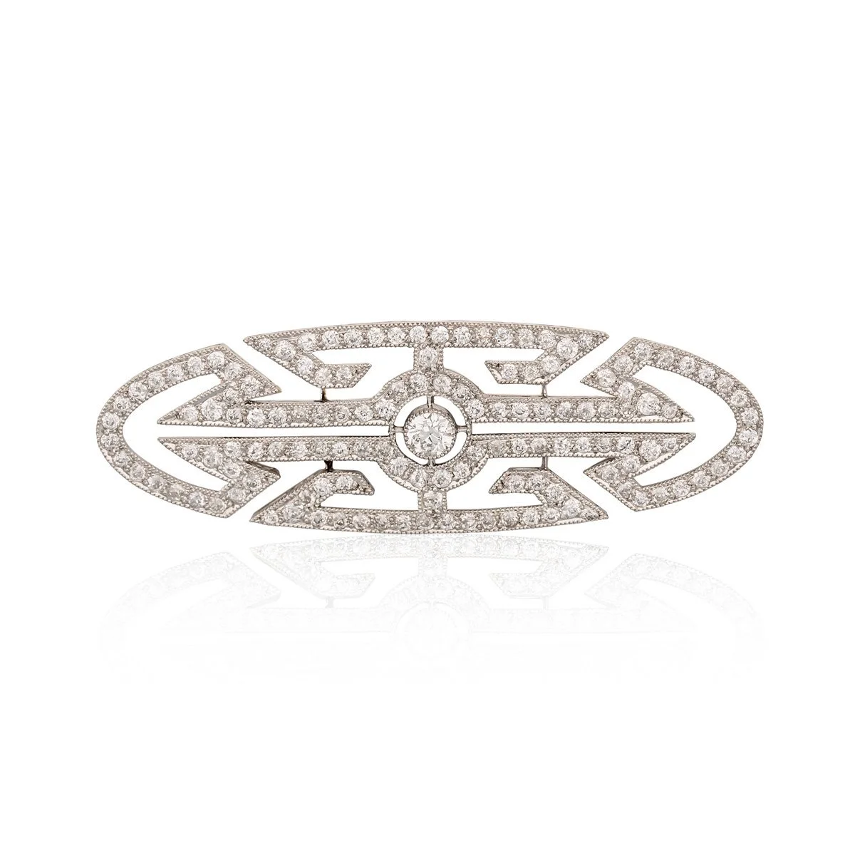 ART DECO 1920'S PLATINUM AND DIAMOND BROOCH. Of geometrical design, the open work oval brooch is set in platinum with old cut round diamonds. 1.6 cts twt  Length 5.5 cms