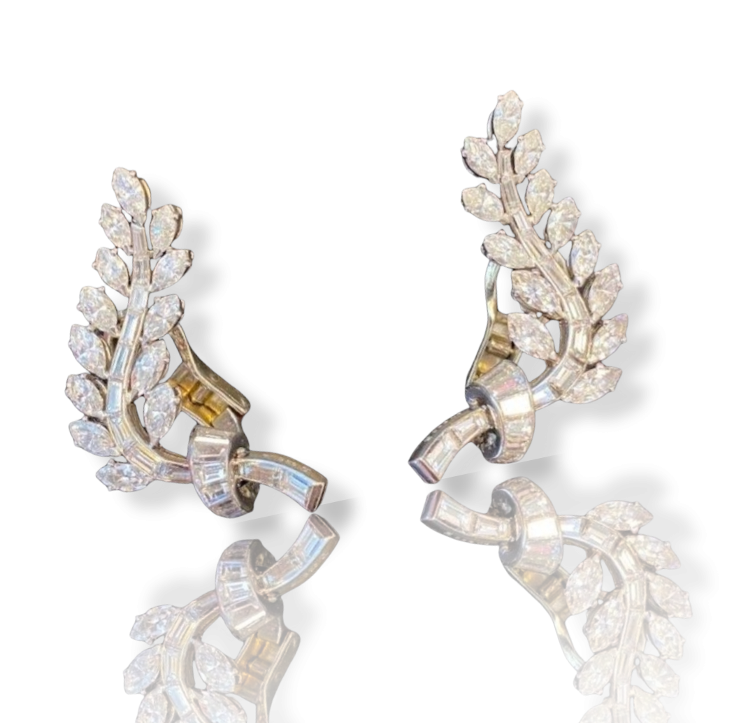 MID CENTURY 1950's PLATINUM AND DIAMOND EARRINGS of floral design set with 26 marquise cut and 36 baguette cut diamonds circa 6 cts twt.