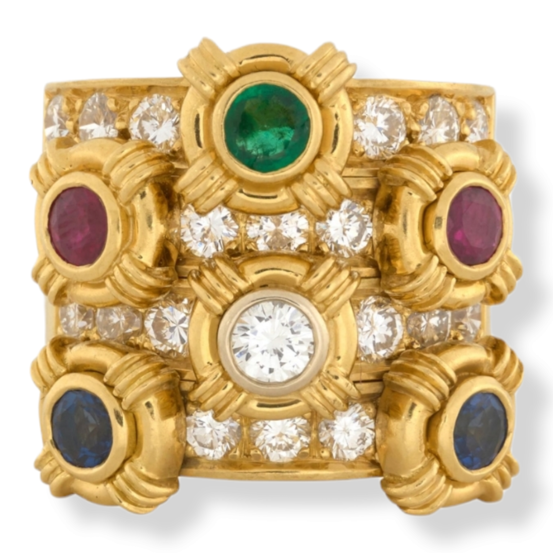 1980'S SET OF FOUR GOLD DIAMOND GEMSET RINGS 
A diamond and gem-set suite of four stackable rings, set with round ruby, sapphire, emeralds spaced by brilliant cut diamonds for a total weight of 0.95 cts. The rings can be worn individually or stacked 