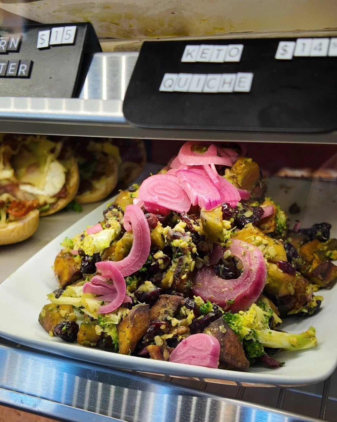 Fresh salad, made daily and ready in the cabinet 🥗

Roasty veg, crunchy greens, and those pink pickled onions that make every bite better 😍

Perfect if you want something quick that still feels like a proper lunch.

Pop in and grab one while it&rsq