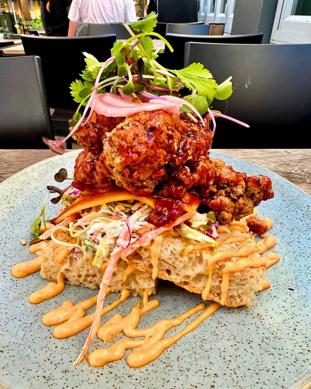 New on the brunch menu, and it&rsquo;s not here to be subtle.

Korean fried chicken, fresh slaw, pickled onion, herbs, and sauce stacked on focaccia.

Crunchy, saucy, fresh, and full of flavour from the first bite.

This is the kind of brunch you mak