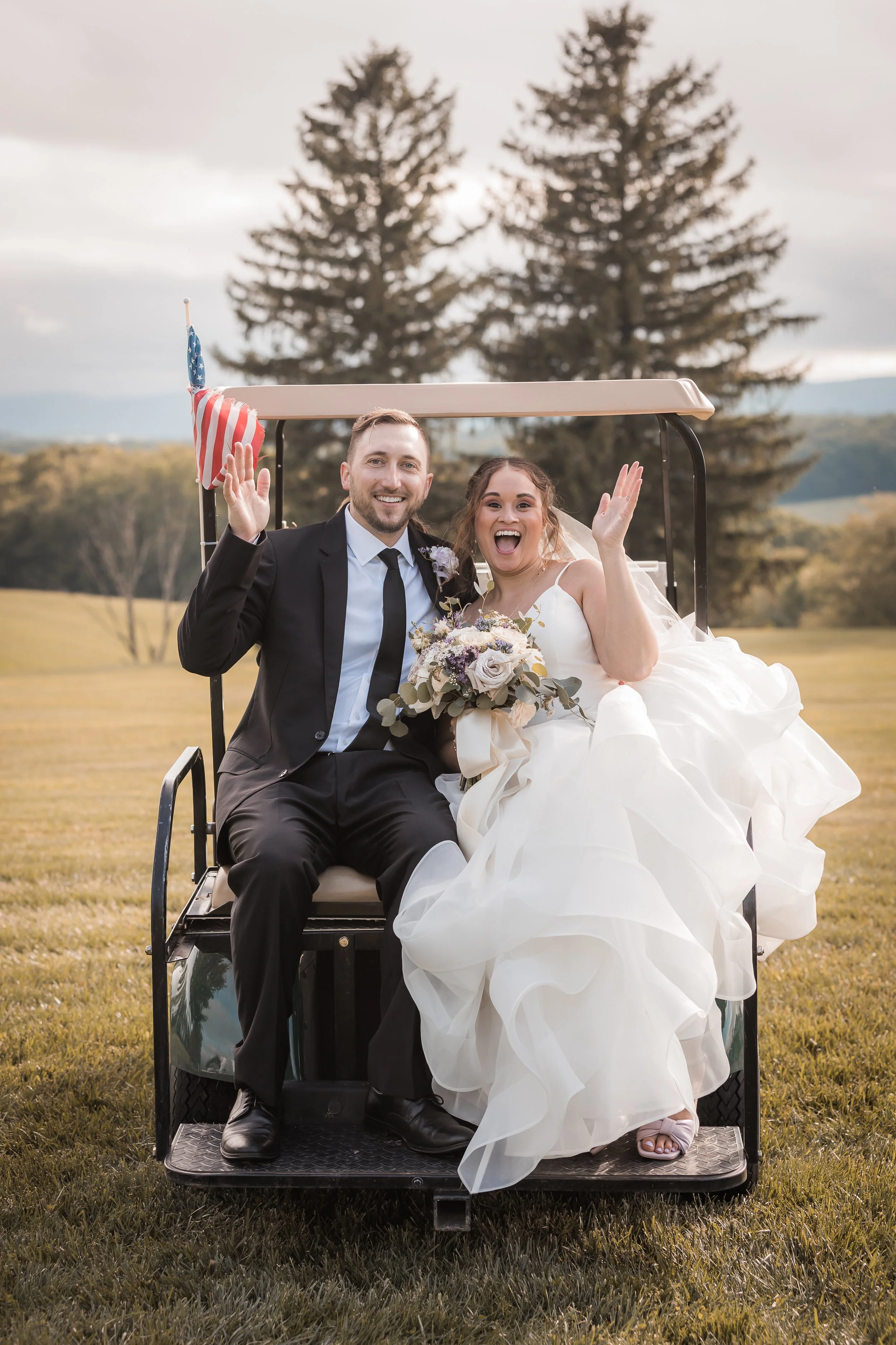 Bride and Groom on golf cart at Clear Ridge Events