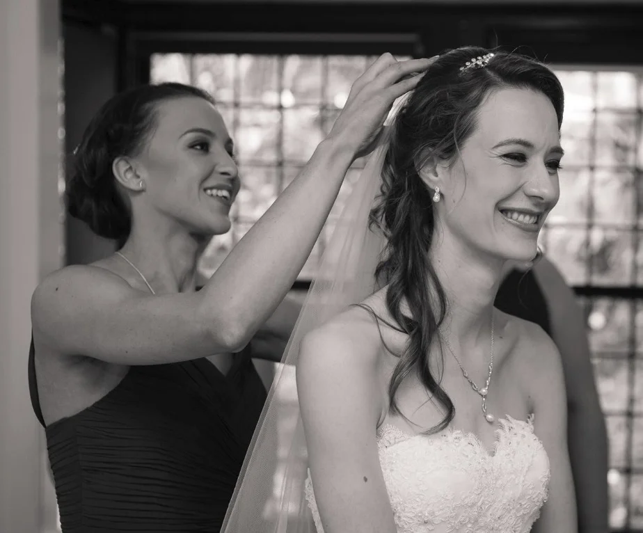 Fi helping Helen with her hair piece just before her wedding in 2016.