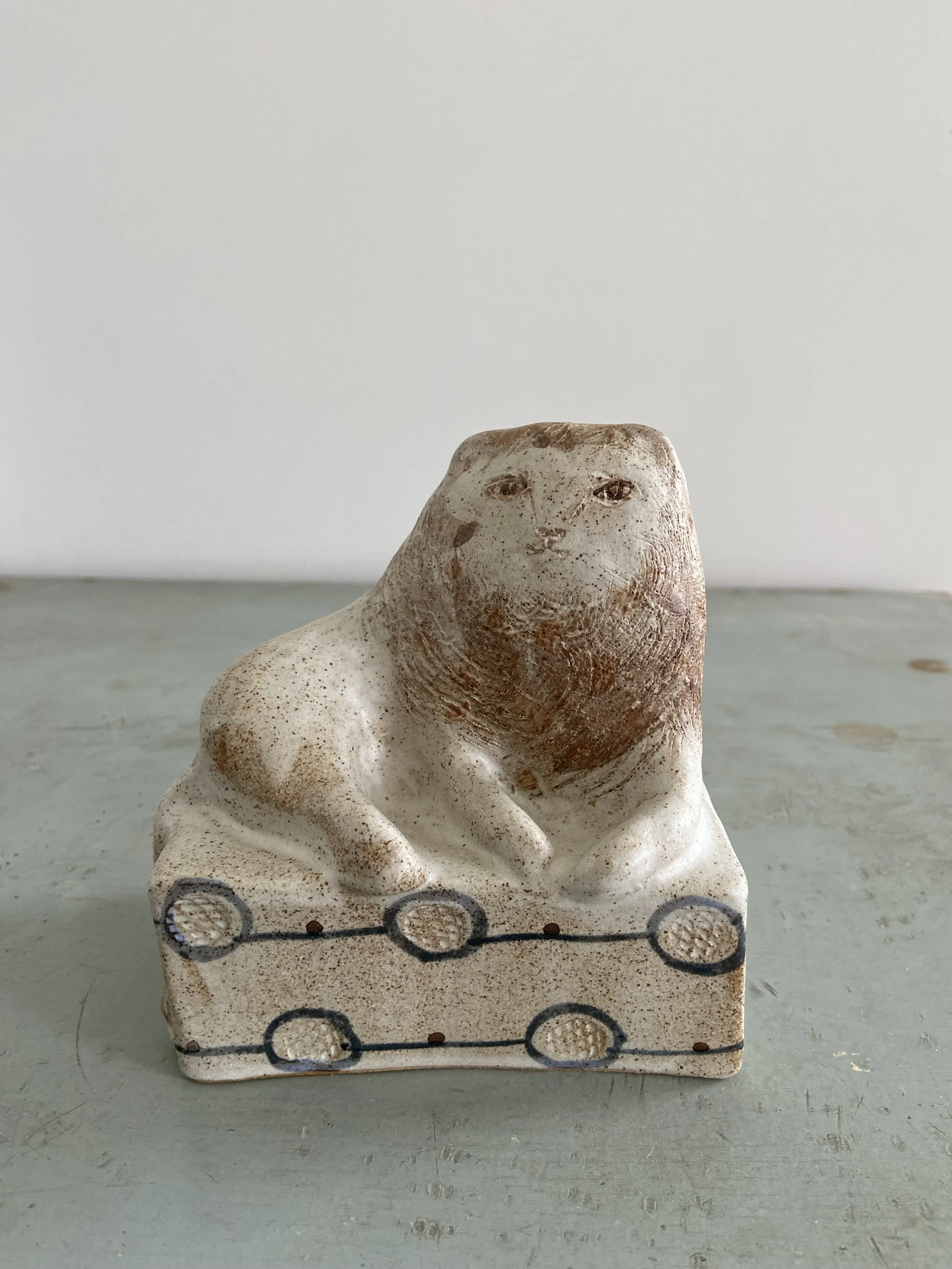 Handmade stoneware lions by Charlotte salt