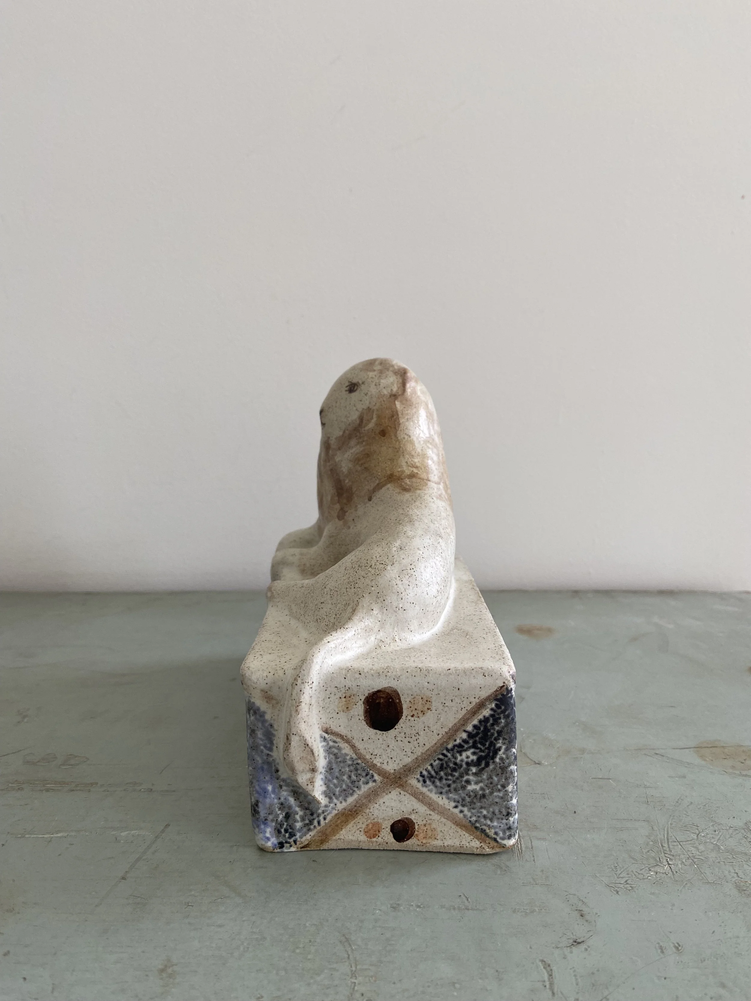 Handmade stoneware lions by Charlotte salt