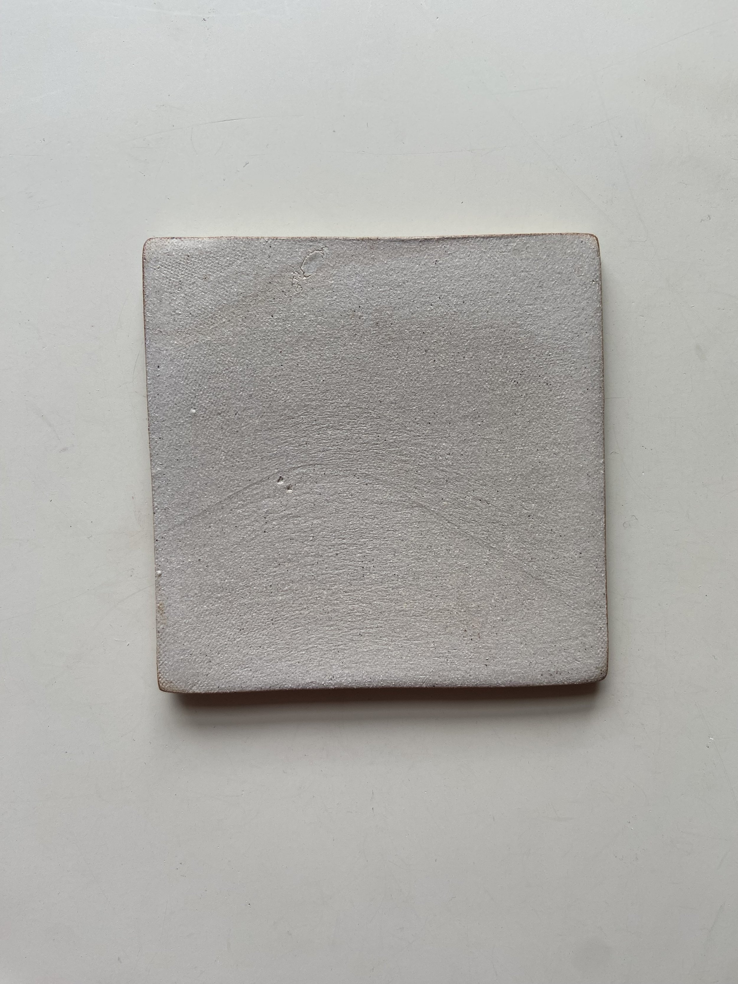 handmade stoneware tiles by Charlotte Salt