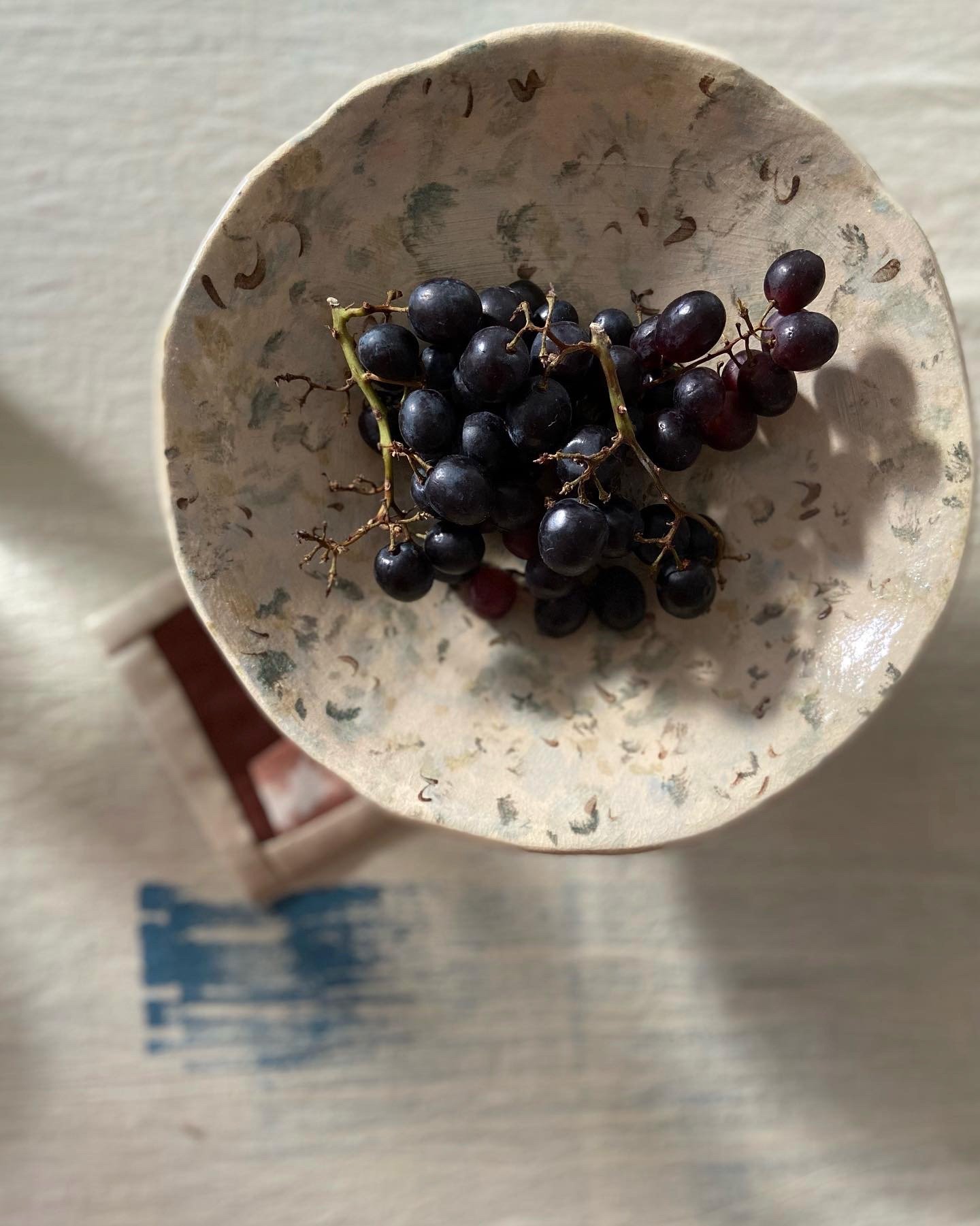 Slip decorated fruit stand by Charlotte Salt