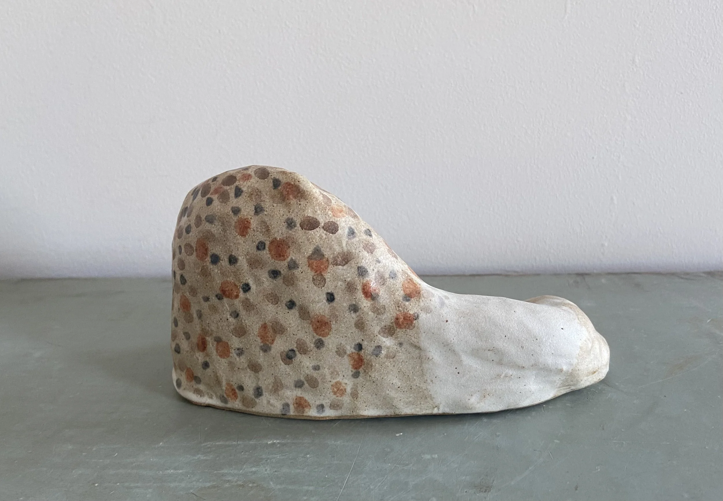 Ceramic lions by Charlotte Salt