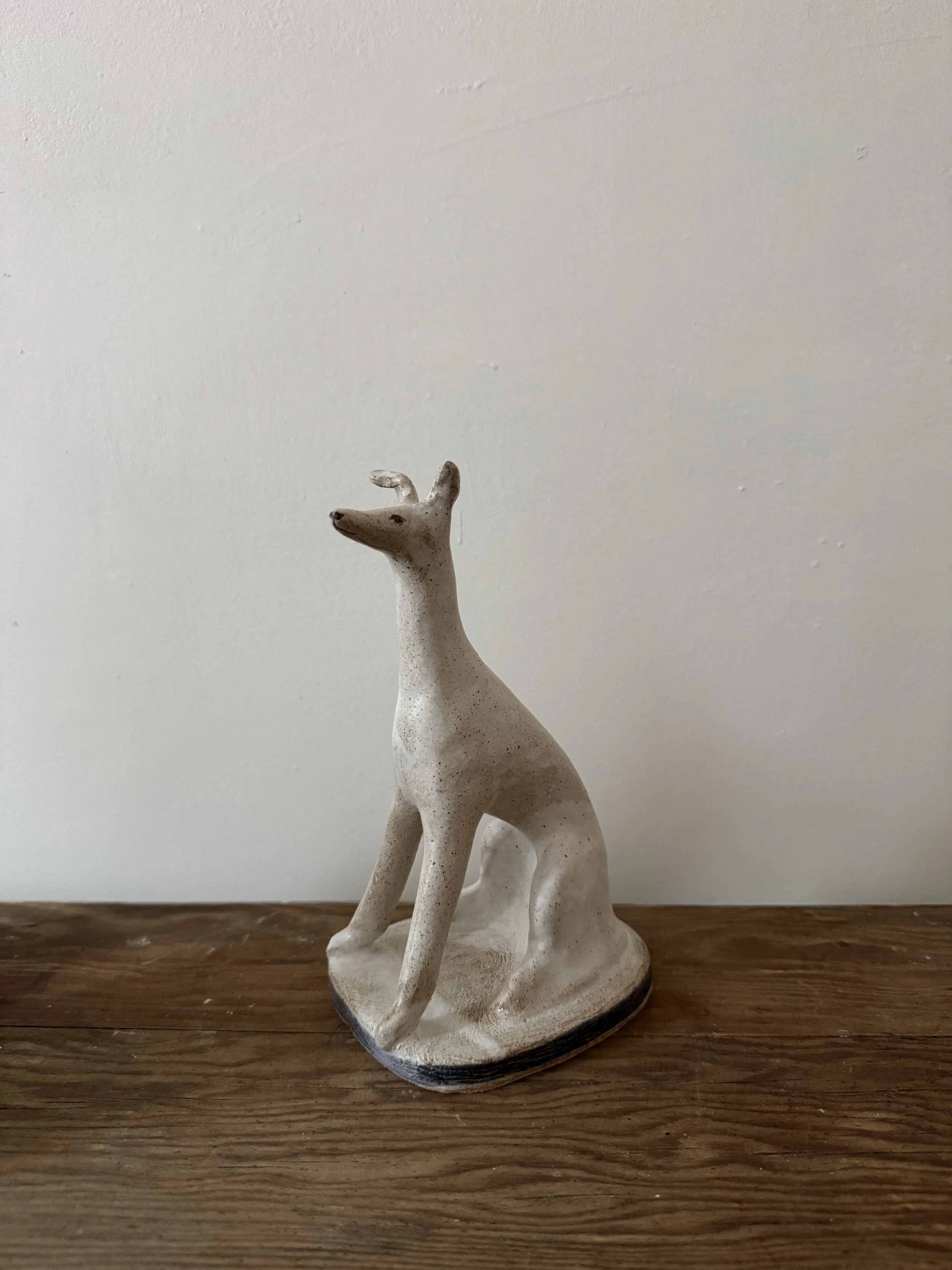 Stoneware hounds by Charlotte Salt