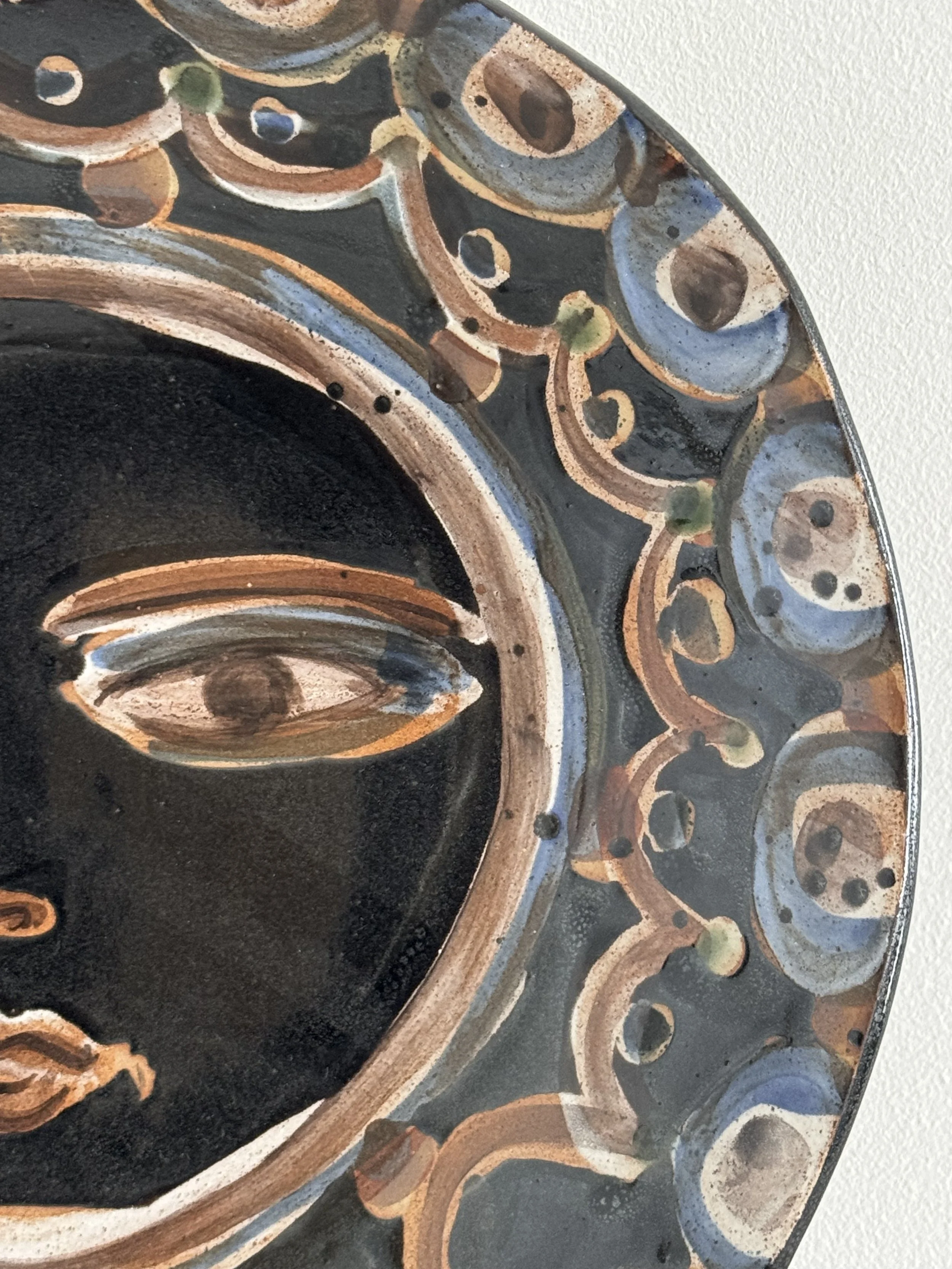 Handmade ceramic face plates by Charlotte Salt