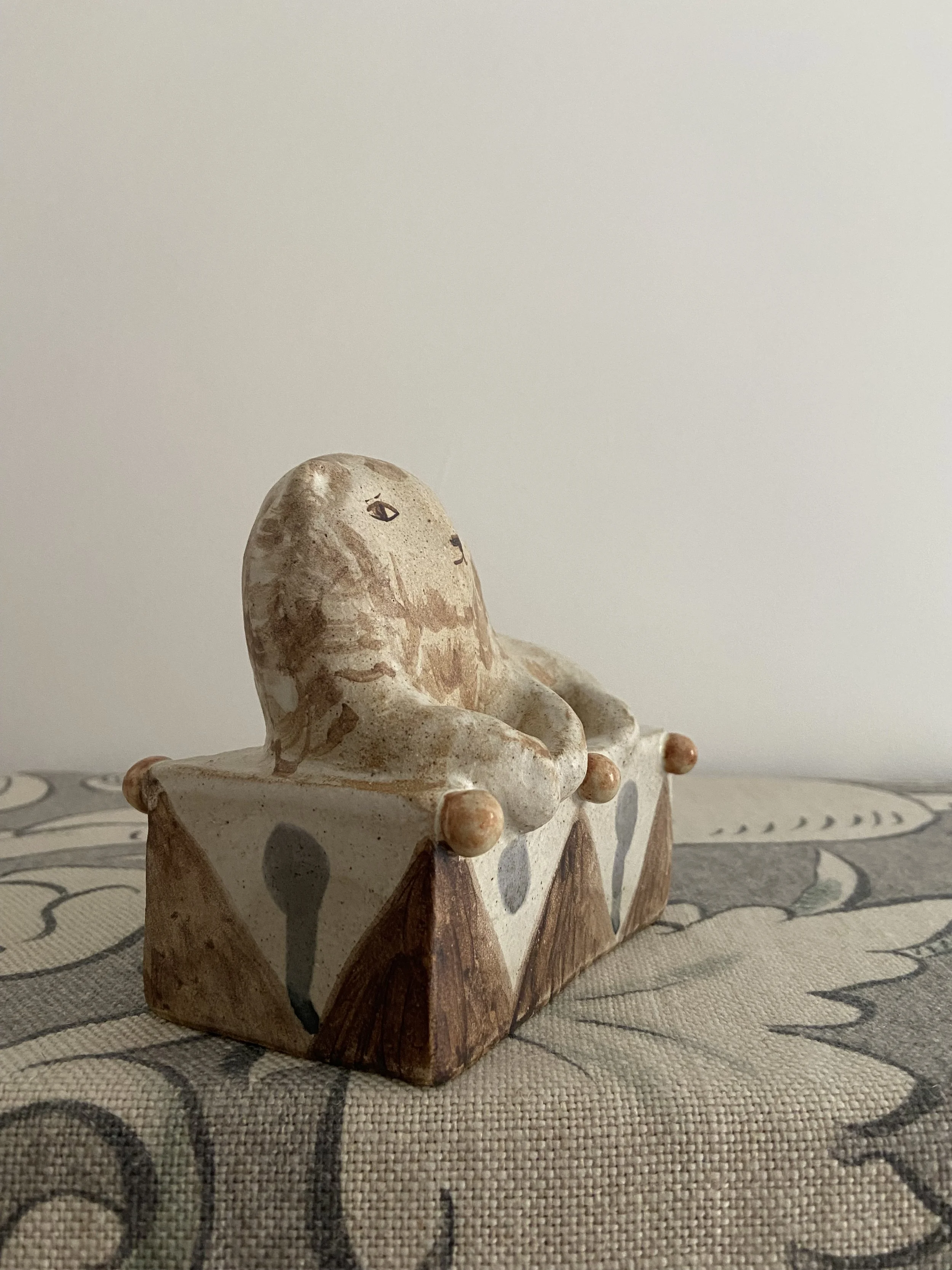 Stoneware lions by Charlotte Salt