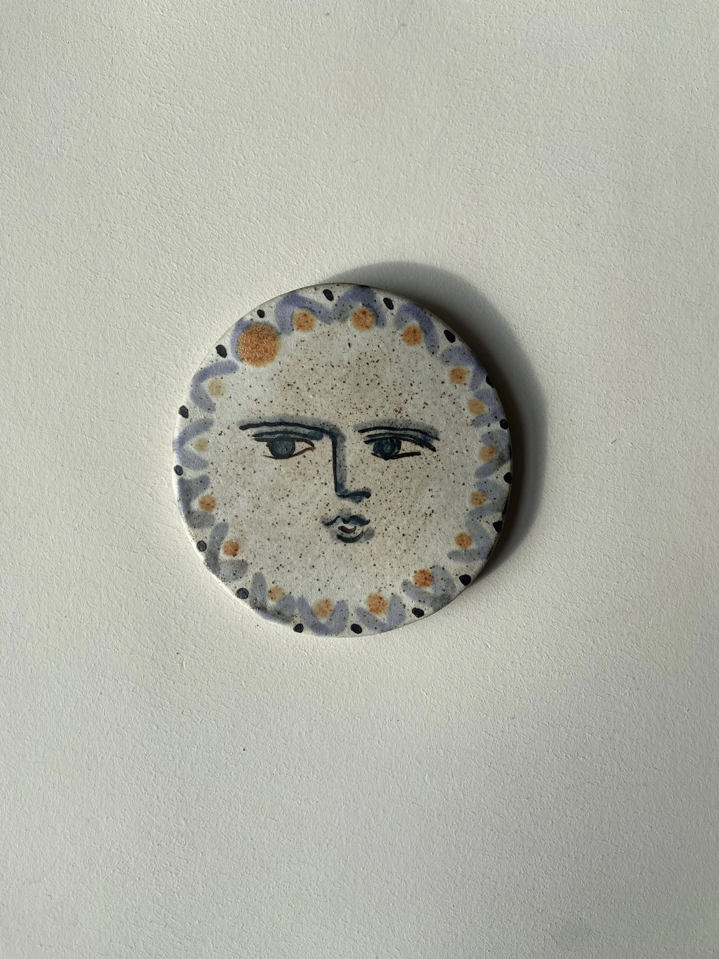 Handmade face disc by Charlotte Salt