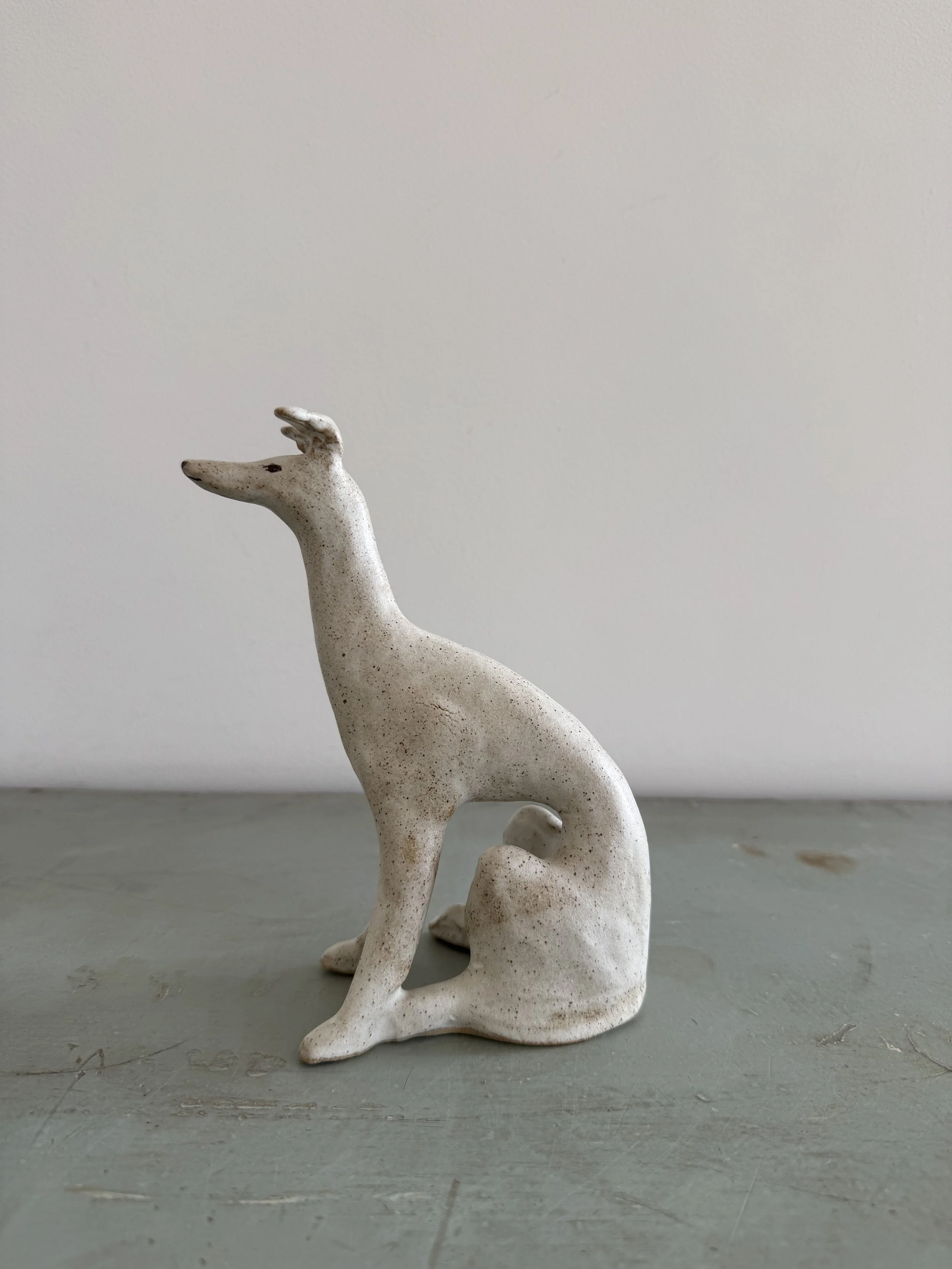 Stoneware hounds by Charlotte Salt